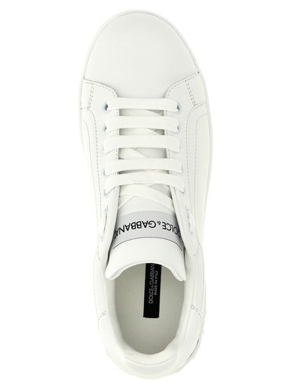 Sneakers by Dolce & Gabbana for women in calfskin leather white presents a sumptuous silhouette, artfully capturing the essence of the Women's Low Top Calfskin Leather Sneakers with its sumptuous low-top style design.