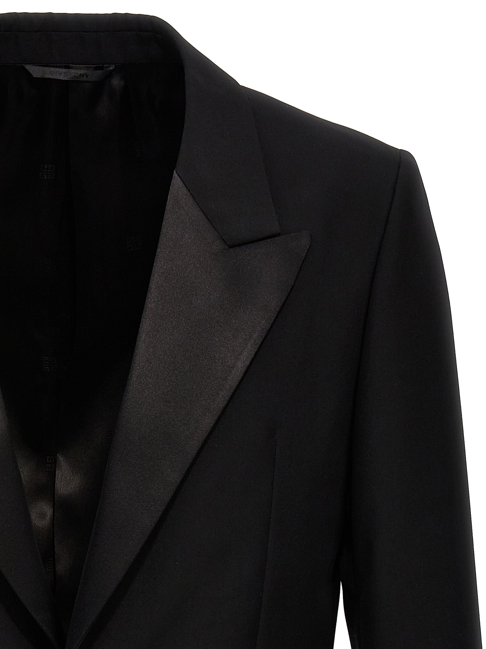 Blazer by Givenchy for men in satin wool black presents a distinguished silhouette, detailed with a distinguished lapel peak-lapel neckline and distinctive for a truly sophisticated finish.