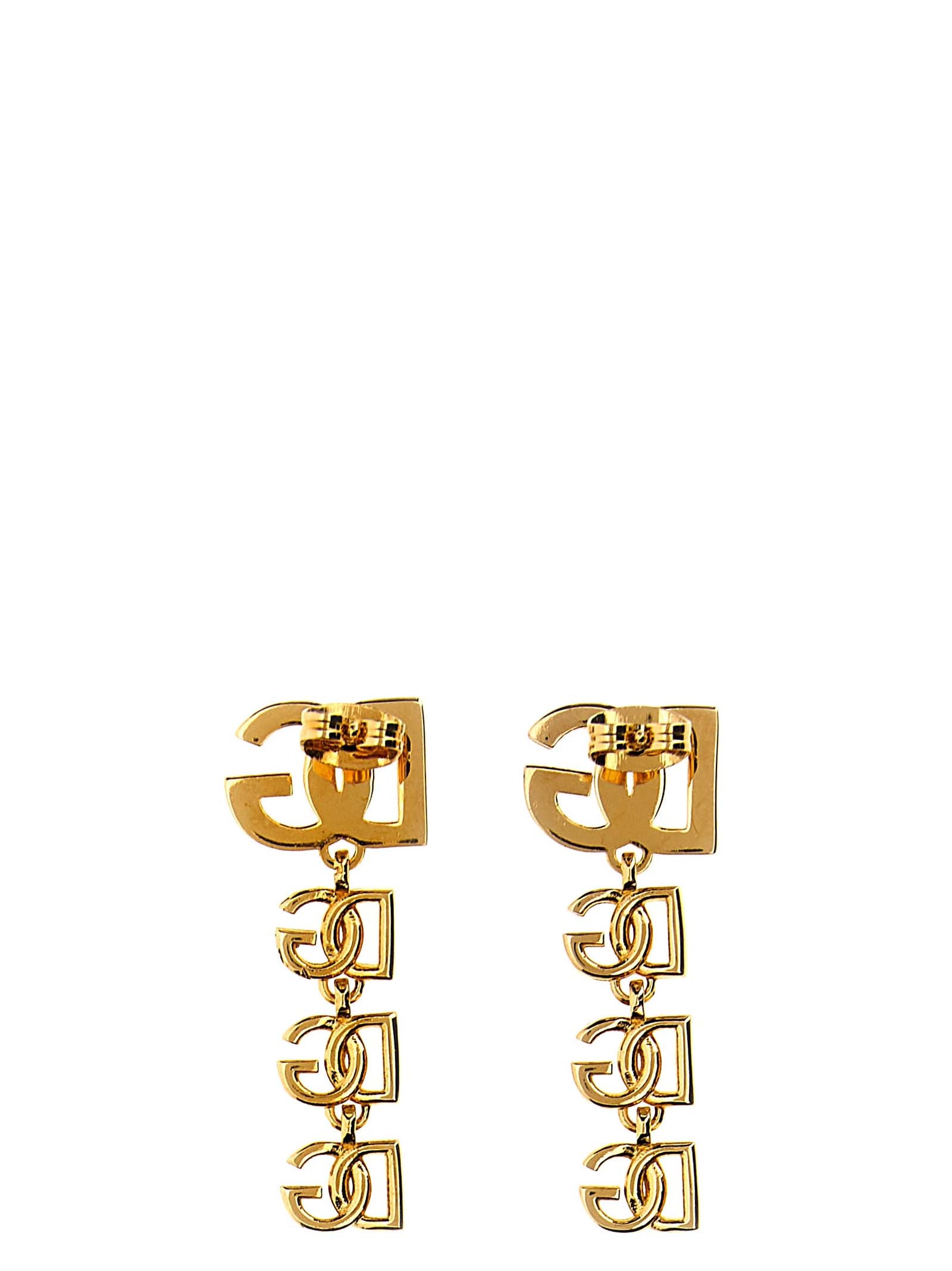 Earrings by Dolce & Gabbana for women in stretch denim cotton gold & silver showcases a enchanting silhouette, artfully incorporating the intricate seen in the Women's Gold SIlver Brass Earrings.