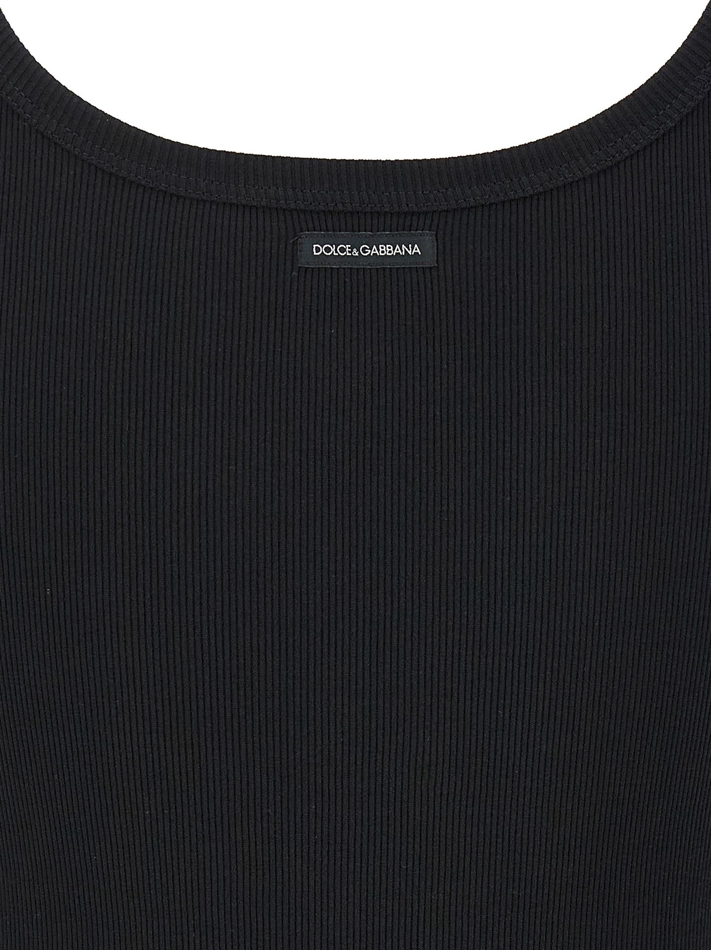 Tank Top by Dolce & Gabbana for women in cotton black presents a uncompromising silhouette, artfully detailed with a uncompromising and for a sophisticated, uncompromising finish.