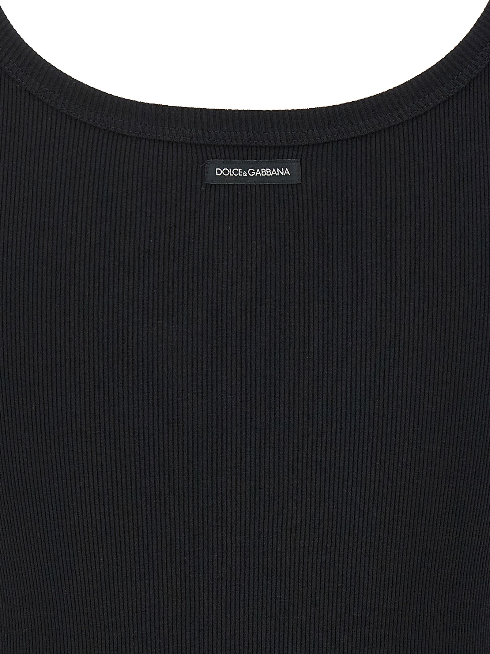 Tank Top by Dolce & Gabbana for women in cotton black presents a uncompromising silhouette, artfully detailed with a uncompromising and for a sophisticated, uncompromising finish.