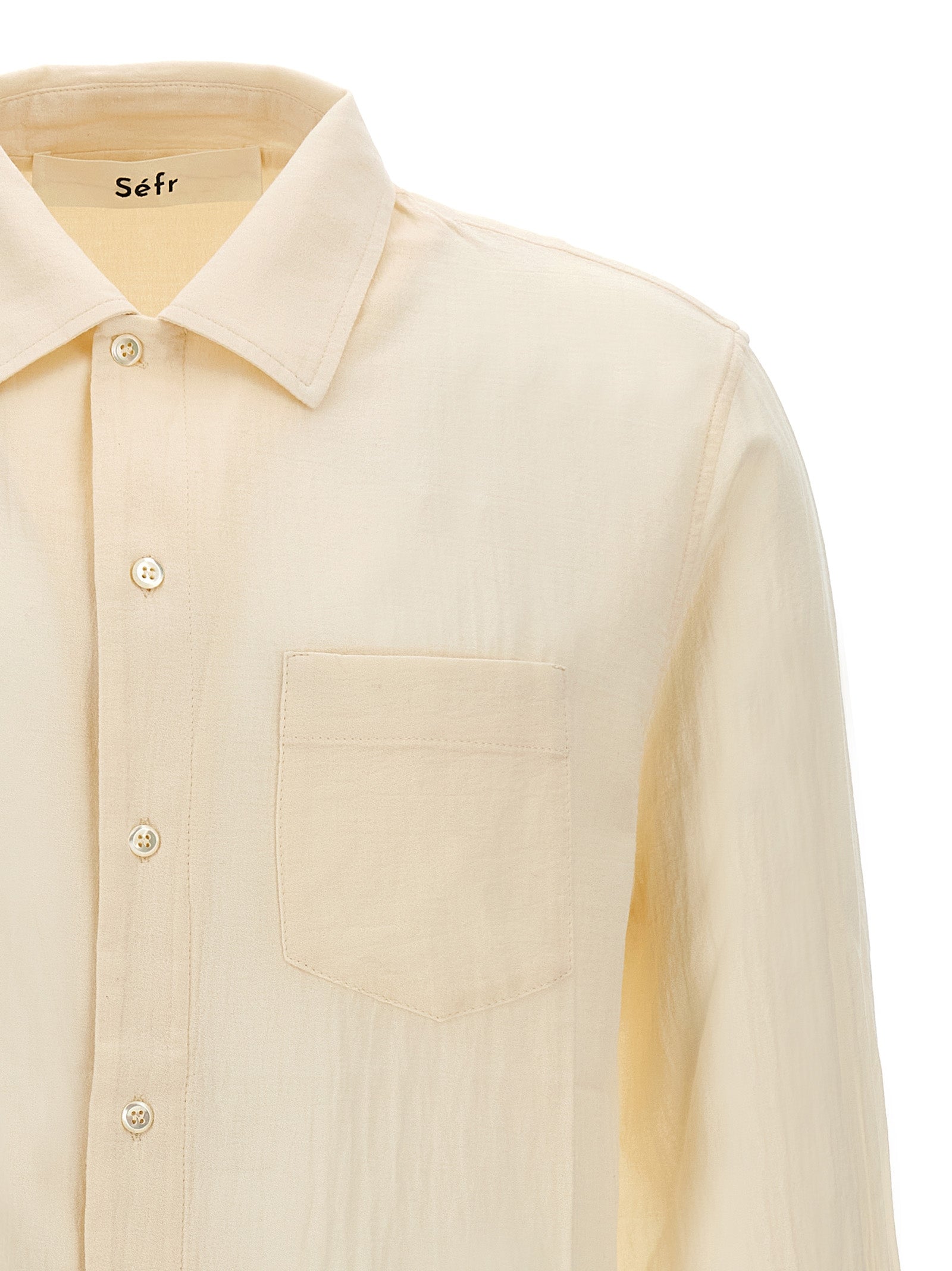 Shirt by SÉFR for men in cotton white showcases a sublime silhouette, artfully detailed with a sublime and for a sophisticated, sublime finish.