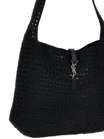 Shopper Tote Bag by Saint Laurent for unisex in raffia polyurethane leather black features a distinguished Le 5 A 7 Crochet Raffia Polyurethane Leather Shopper Tote Bag design, complete with a secure , ample , and versatile shoulder-strap for a distinguished look.