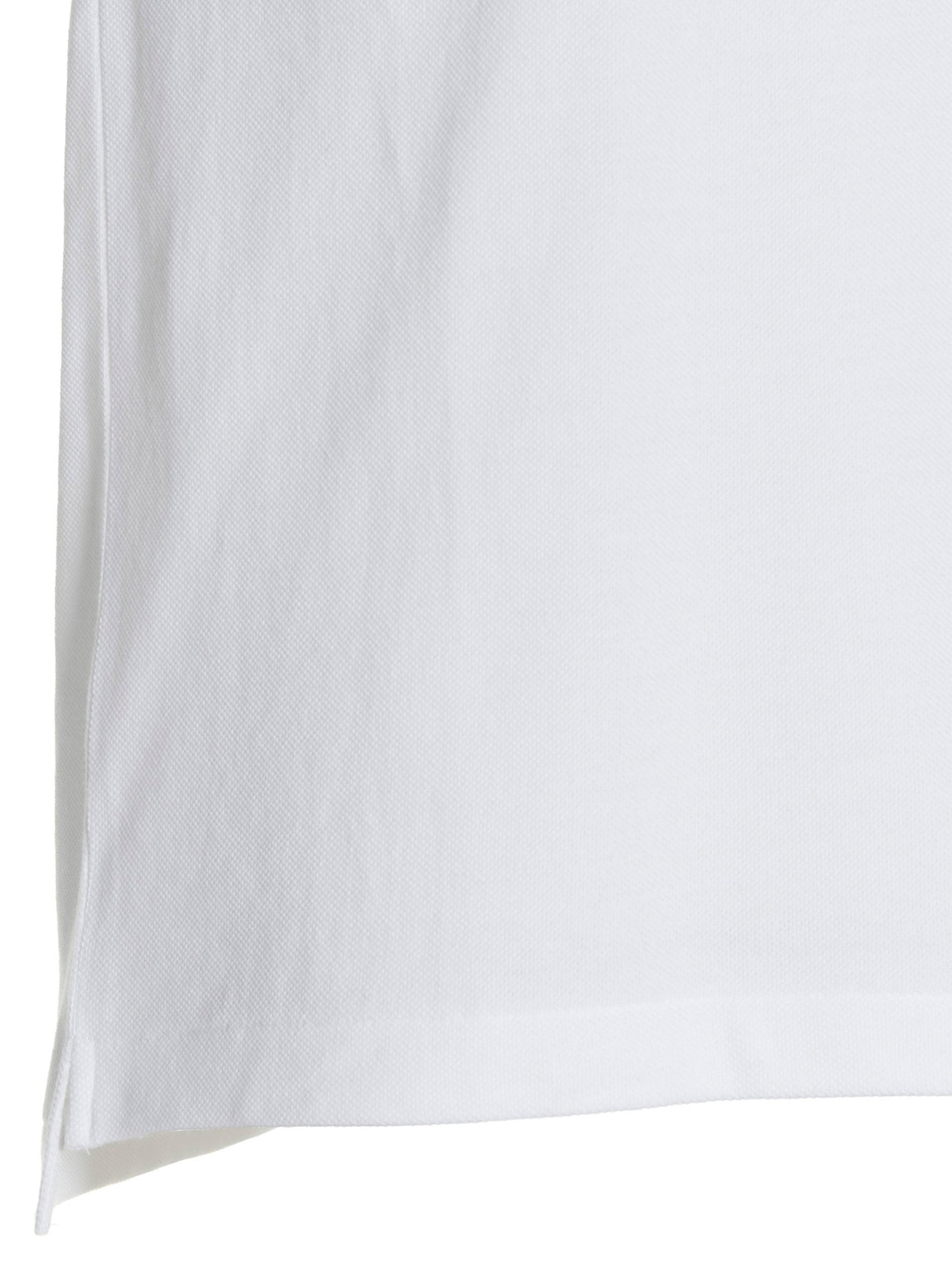 Polo Shirt by Comme Des Garçons Play for men in cotton white showcases a sharp silhouette, detailed with a refined and sharp for a sophisticated finish.