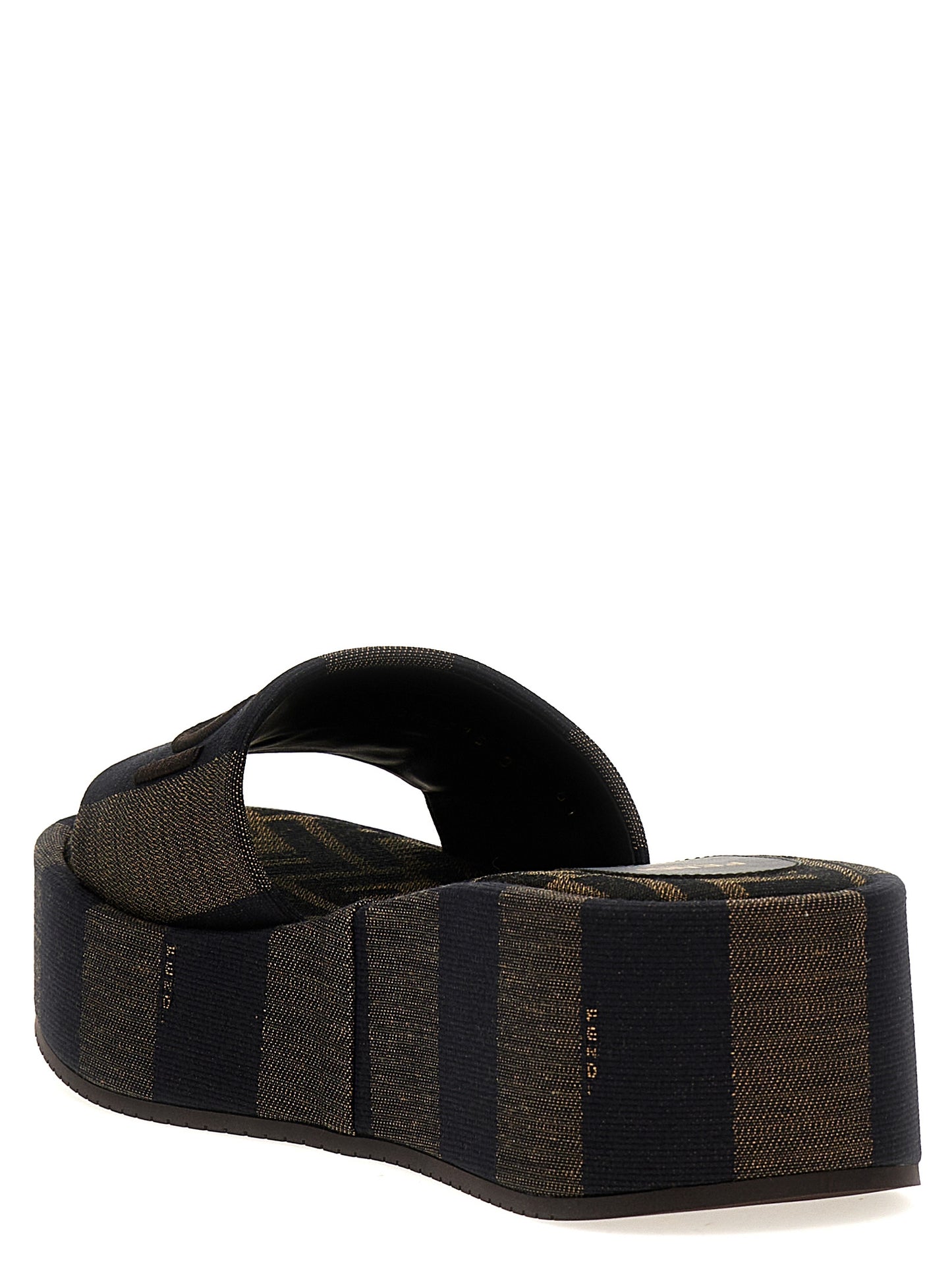 Sliders Sandals Flat Shoes by Fendi for women in cotton brown & striped showcases a enchanting silhouette as part of the Women's Cotton Sliders Sandals Flat Shoes collection, defined by a enchanting and for a enchanting look.