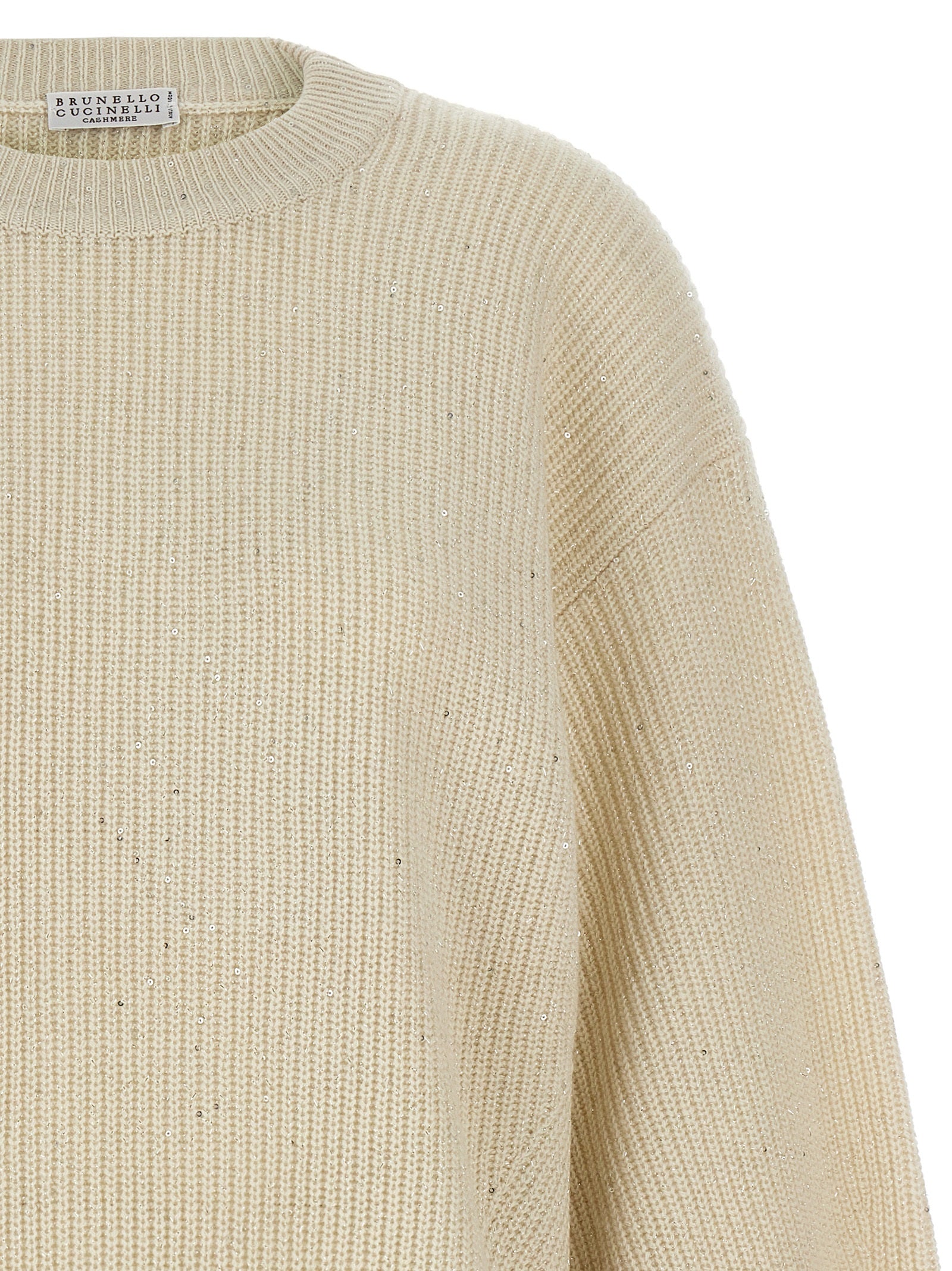 Cardigan by Brunello Cucinelli for women in cashmere polyamide & sequins white presents a textural silhouette, artfully finished with a textural crew neckline and for a sophisticated, textural look.