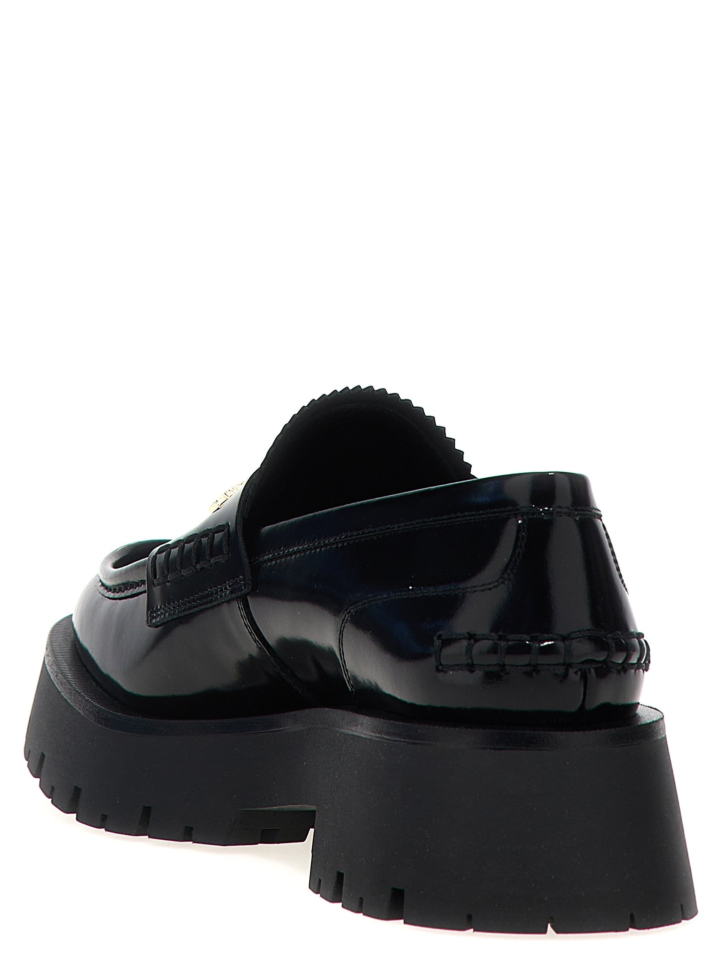 Flat Loafer Slip-On Shoes by Alexander Wang for women in bos taurus cowhide leather black showcases a timeless silhouette from the Women's Bos Taurus Cowhide Leather Flat Loafer Slip-On Shoes collection, featuring a timeless flat and for a timeless finish.