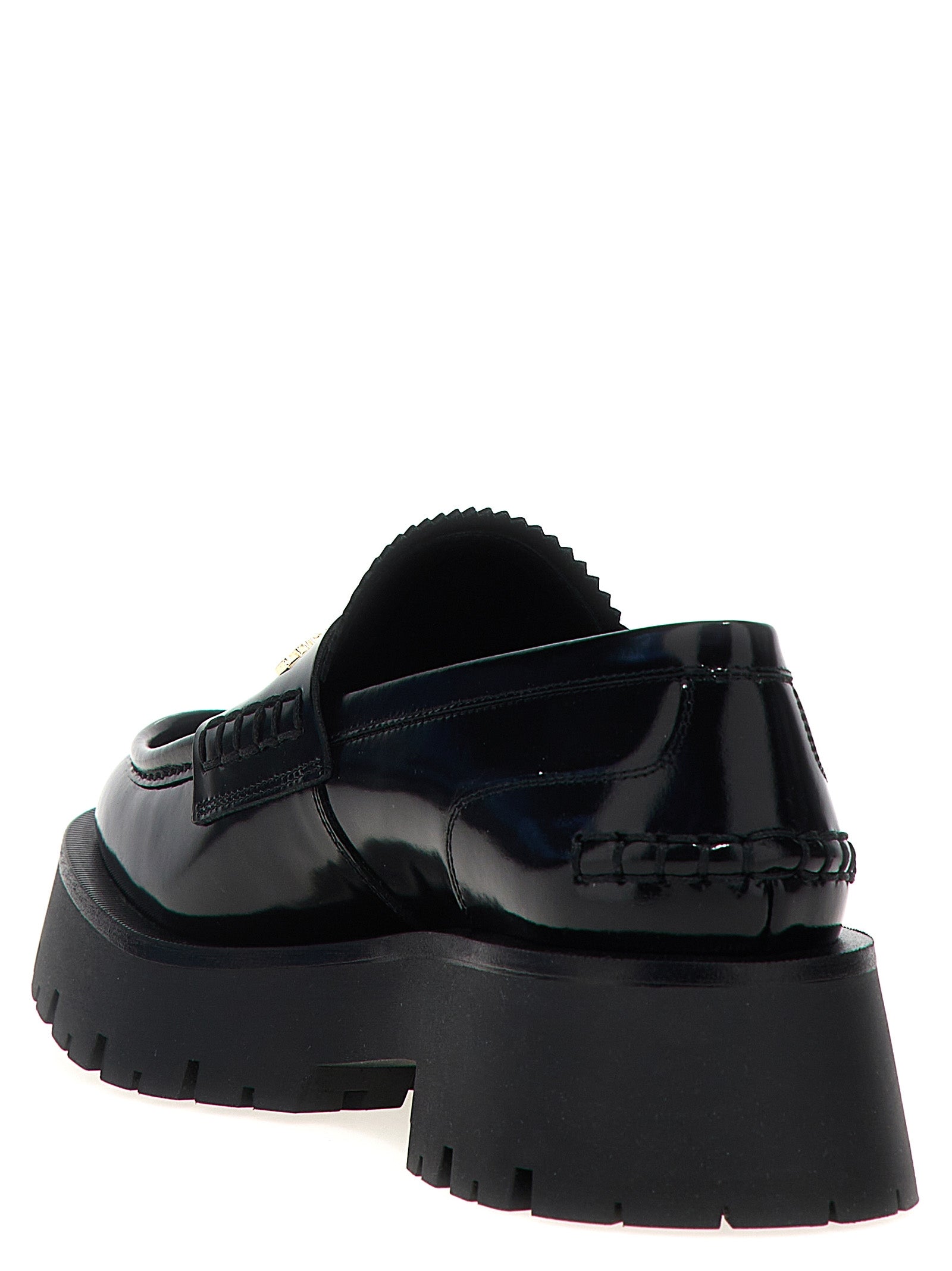 Flat Loafer Slip-On Shoes by Alexander Wang for women in bos taurus cowhide leather black showcases a timeless silhouette from the Women's Bos Taurus Cowhide Leather Flat Loafer Slip-On Shoes collection, featuring a timeless flat and for a timeless finish.