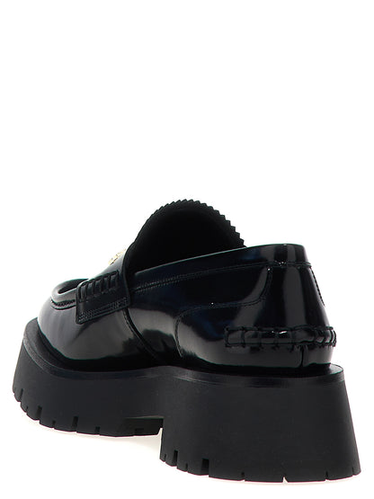Flat Loafer Slip-On Shoes by Alexander Wang for women in bos taurus cowhide leather black showcases a timeless silhouette from the Women's Bos Taurus Cowhide Leather Flat Loafer Slip-On Shoes collection, featuring a timeless flat and for a timeless finish.