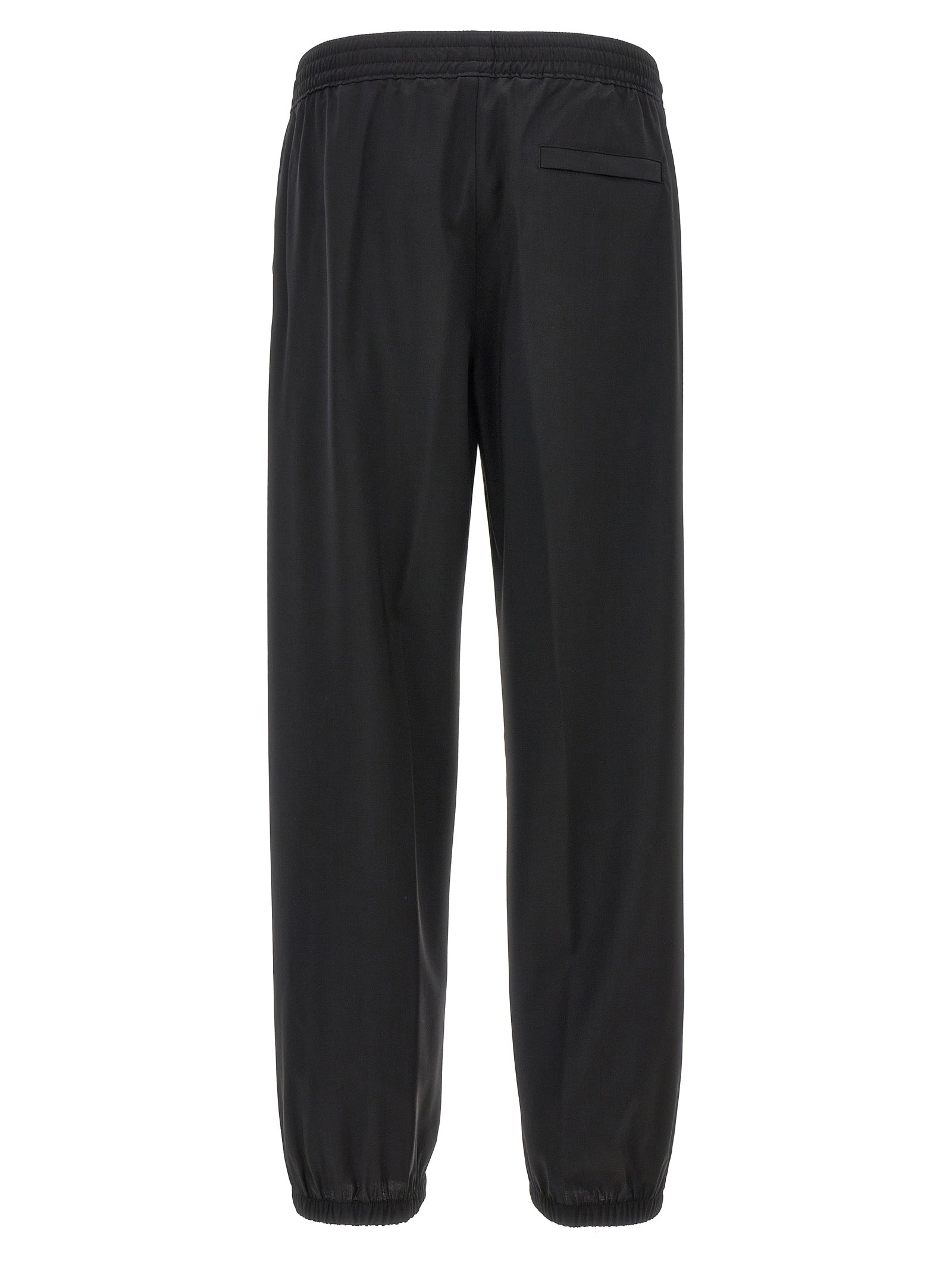 Trousers by Givenchy for men in virgin wool black features an on trend silhouette, showcasing a sophisticated with a long and for an on trend finish.