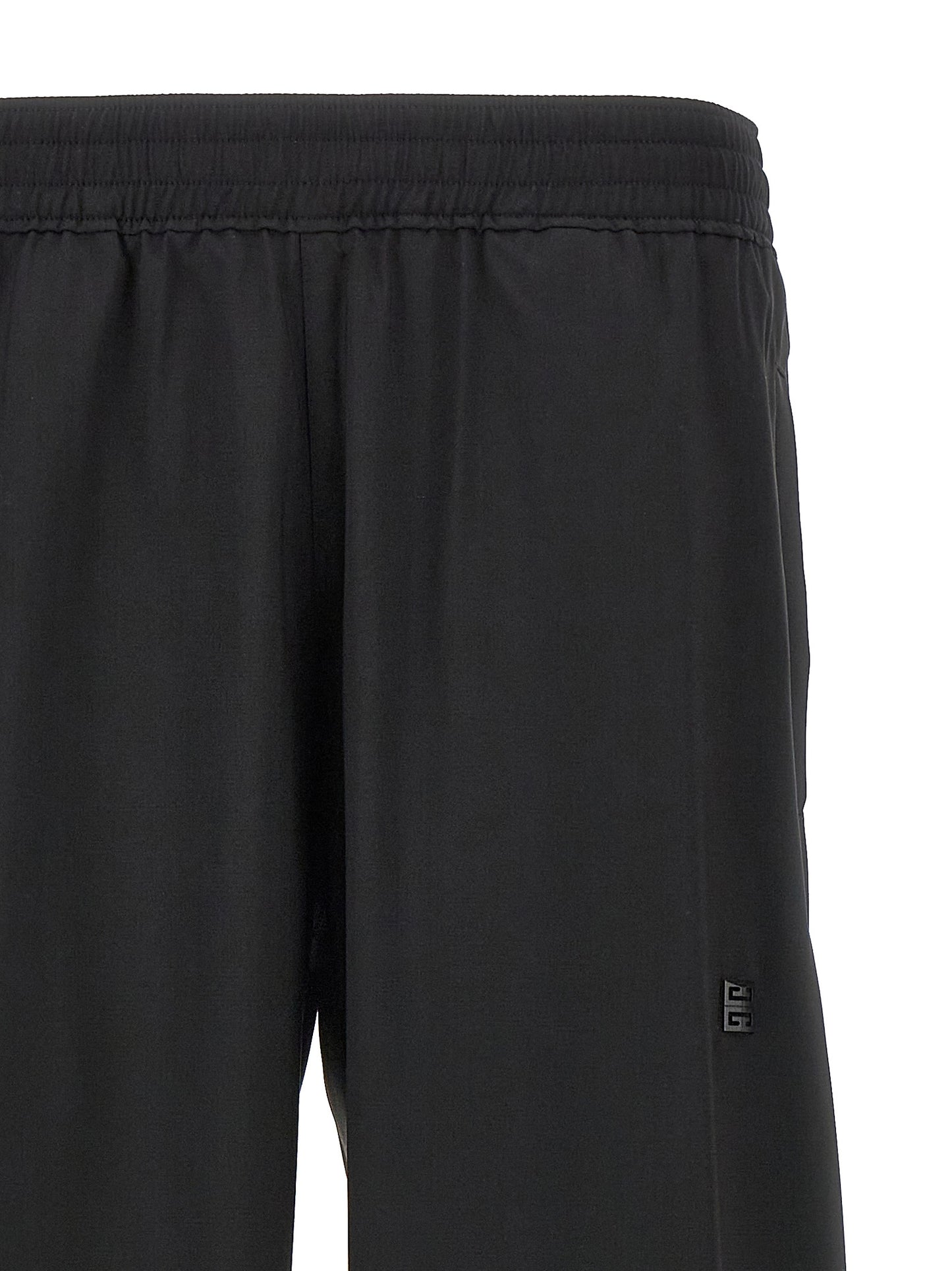 Trousers by Givenchy for men in virgin wool black features an sartorial silhouette, showcasing a precise and long with a sartorial for a refined look.