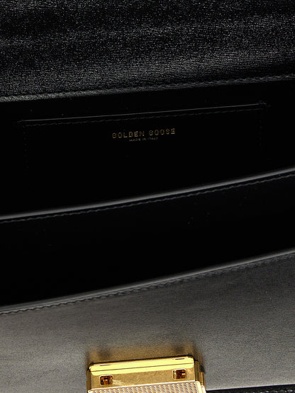 Handbag by Golden Goose for women in leather & metal black features a refined silhouette, showcasing a secure clip, organized , and versatile shoulder-strap, handle & adjustable-strap for a refined finish.