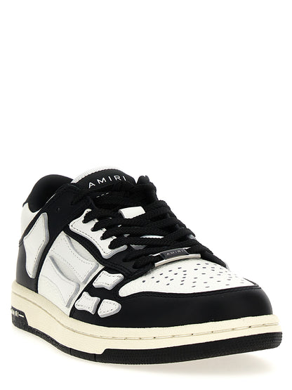 Sneakers by Amiri for women in leather & rubber bicolour, black & white features an timeless silhouette from the Women's Low Top Leather & Rubber Sneakers collection, showcasing a signature low-top style with an timeless finish.