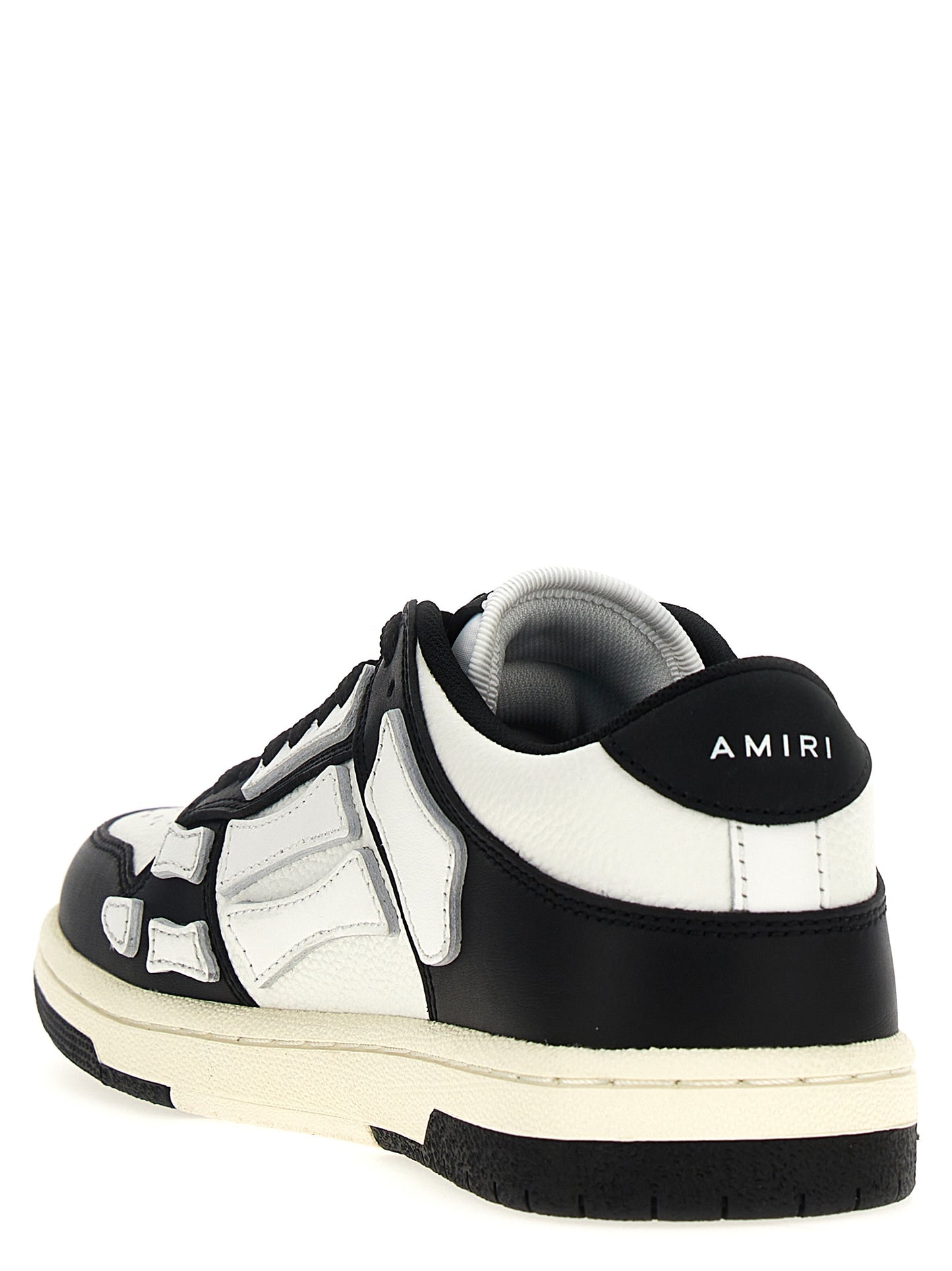 Sneakers by Amiri for women in leather & rubber bicolour, black & white features an fashionable silhouette, showcasing the premium Women's Low Top Leather & Rubber Sneakers in a fashionable low-top style that offers a fashionable finish for refined style.