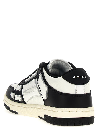 Sneakers by Amiri for women in leather & rubber bicolour, black & white features an fashionable silhouette, showcasing the premium Women's Low Top Leather & Rubber Sneakers in a fashionable low-top style that offers a fashionable finish for refined style.