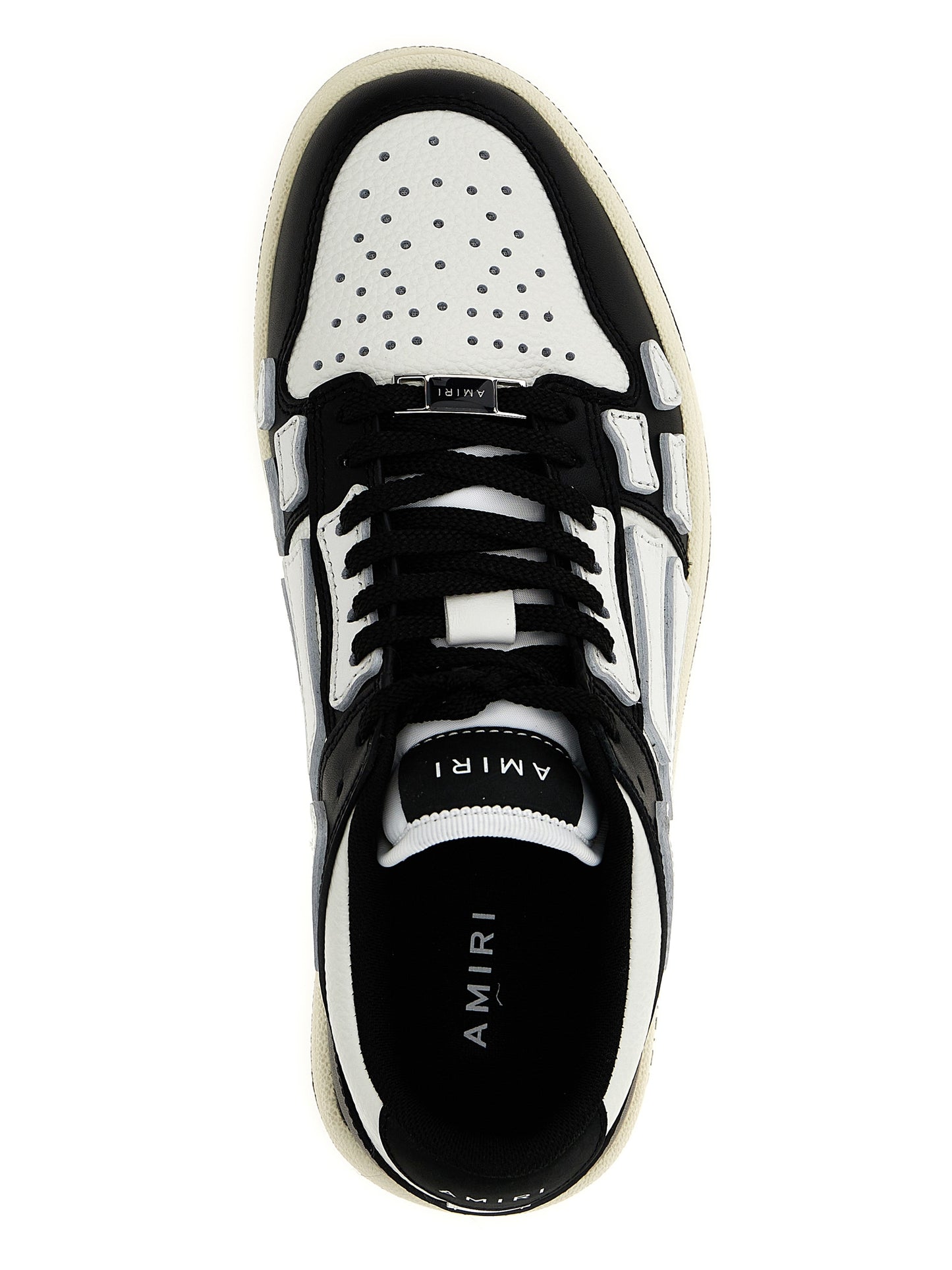 Sneakers by Amiri for women in leather & rubber bicolour, black & white presents a impeccable silhouette as Women's Low Top Leather & Rubber Sneakers, expertly defined by a impeccable low-top style for a impeccable, high-fashion look.