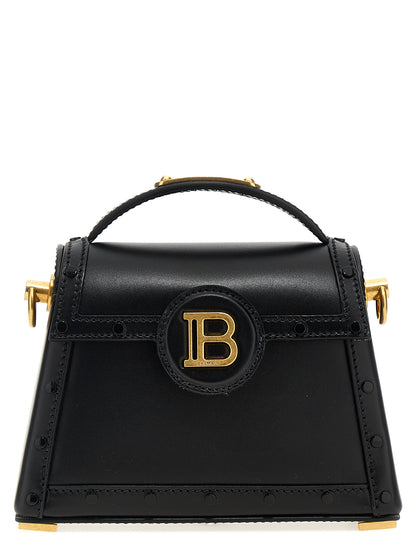 Shoulder Flap Handbag by Balmain for women in calfskin leather black features a refined silhouette, showcasing a secure flap & magnetic, organized , and versatile shoulder-strap & handle for a refined finish.
