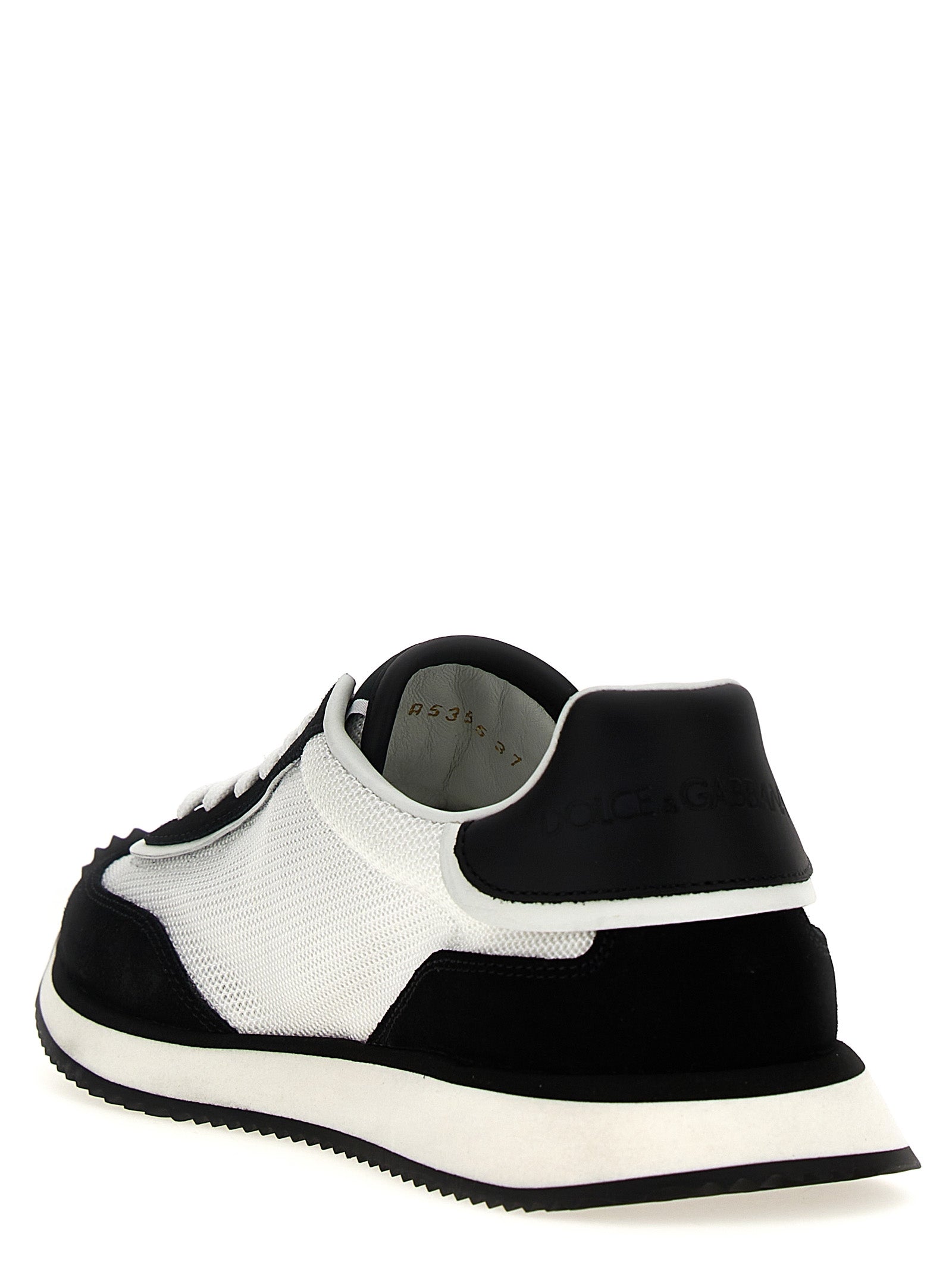 Athletic Sneakers by Dolce & Gabbana for women in suede calfskin leather & polyester bicolour, black & white features an exquisite silhouette, showcasing the premium athletic style of the Women's Athletic Suede Calfskin Leather & Polyester Sneakers with an exquisite finish.