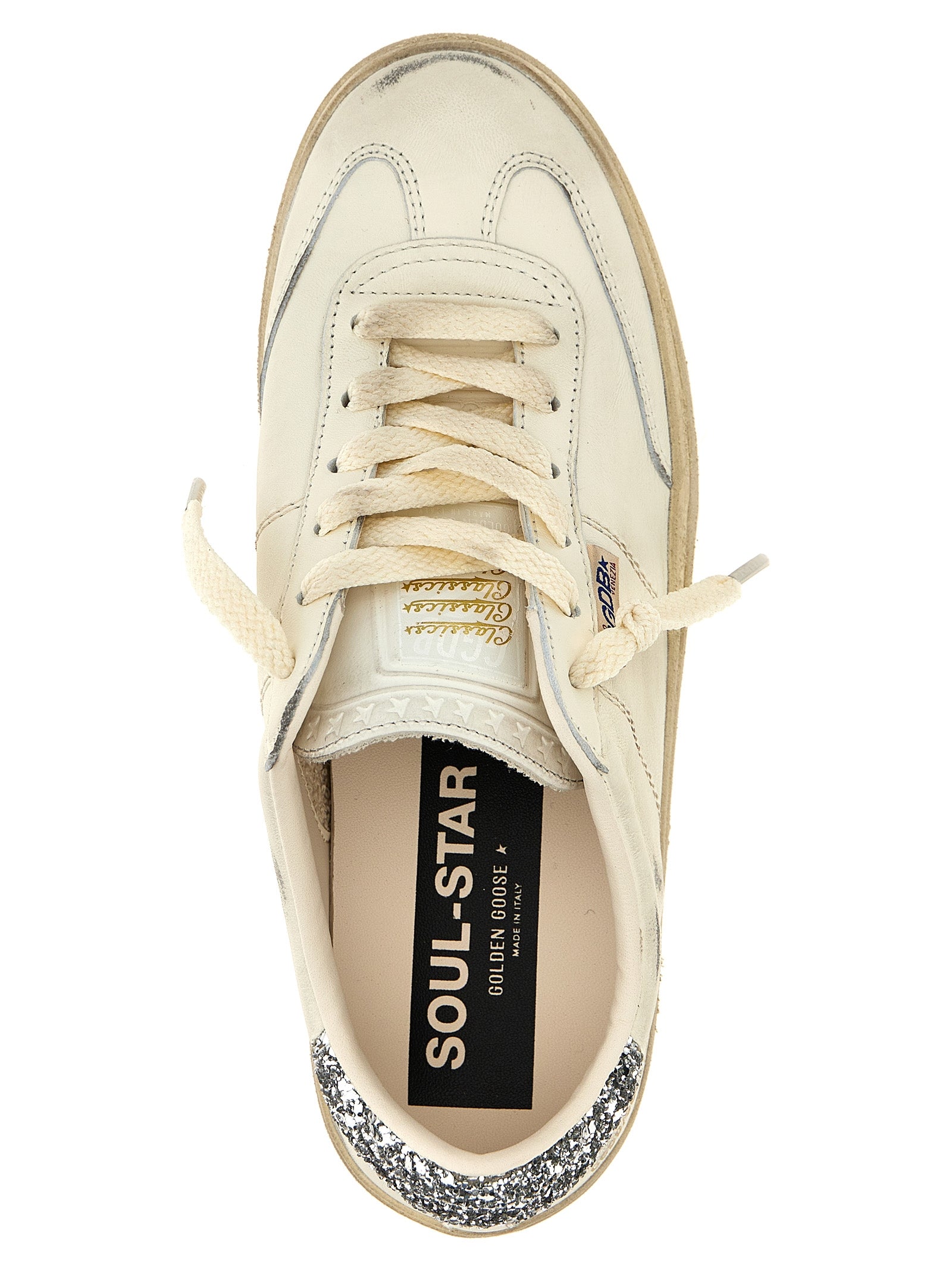 Sneakers by Golden Goose for women in lamb leather white presents a impeccable silhouette as Star Women's Low Top Lamb Leather Sneakers, expertly defined by a impeccable low-top style for a impeccable, high-fashion look.