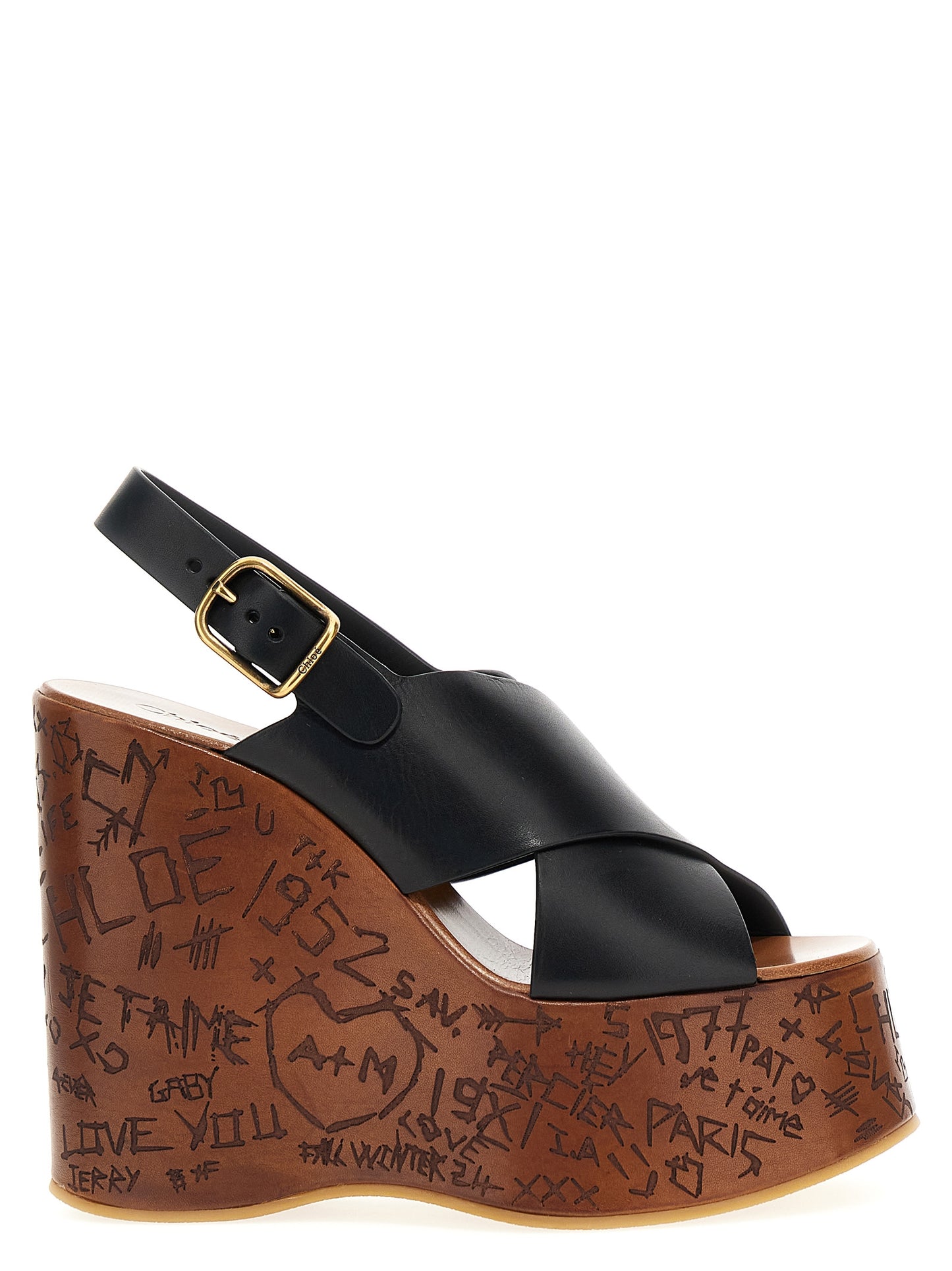 Platform Wedge Sandals by Chloé for women in cowhide leather black & natural showcases a sculptural silhouette as Women's Cowhide Leather Platform Wedge Sandals, defined by a sculptural platform wedge and sculptural for a sculptural look.