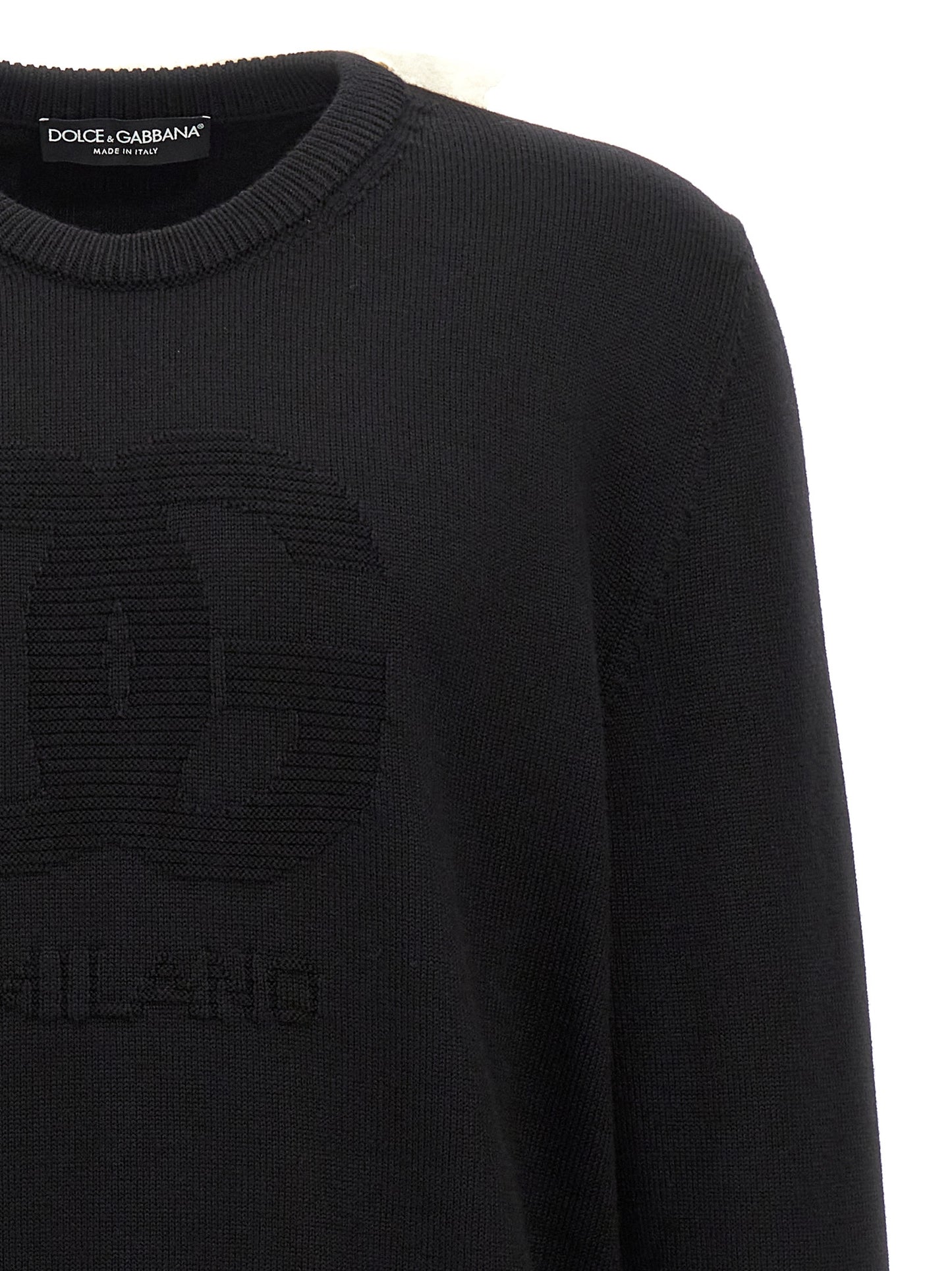 Cardigan by Dolce & Gabbana for men in black features an impeccable silhouette, showcasing a sophisticated crew neckline and detail for a truly impeccable finish.