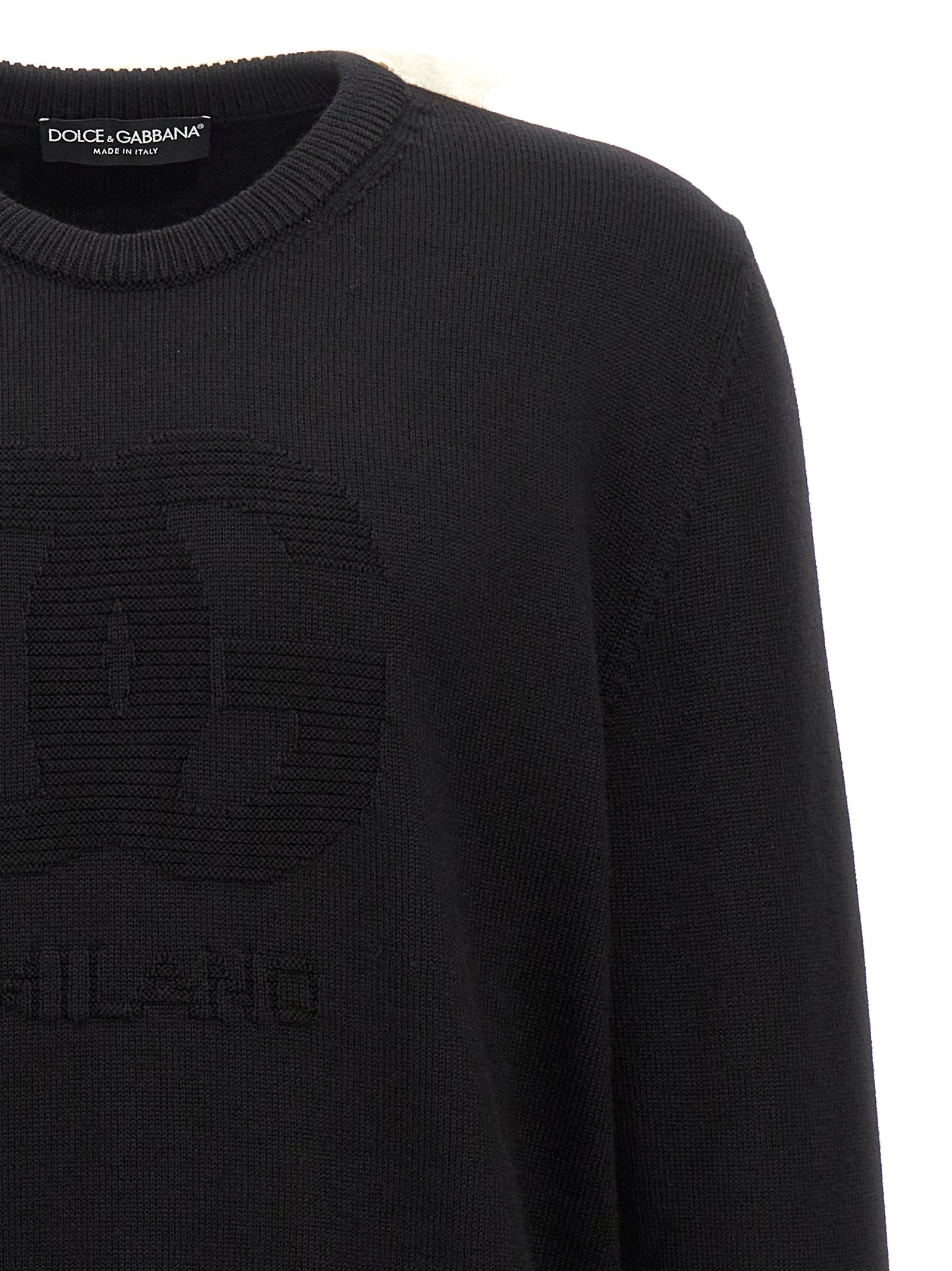 Cardigan by Dolce & Gabbana for men in black features an impeccable silhouette, showcasing a sophisticated crew neckline and detail for a truly impeccable finish.