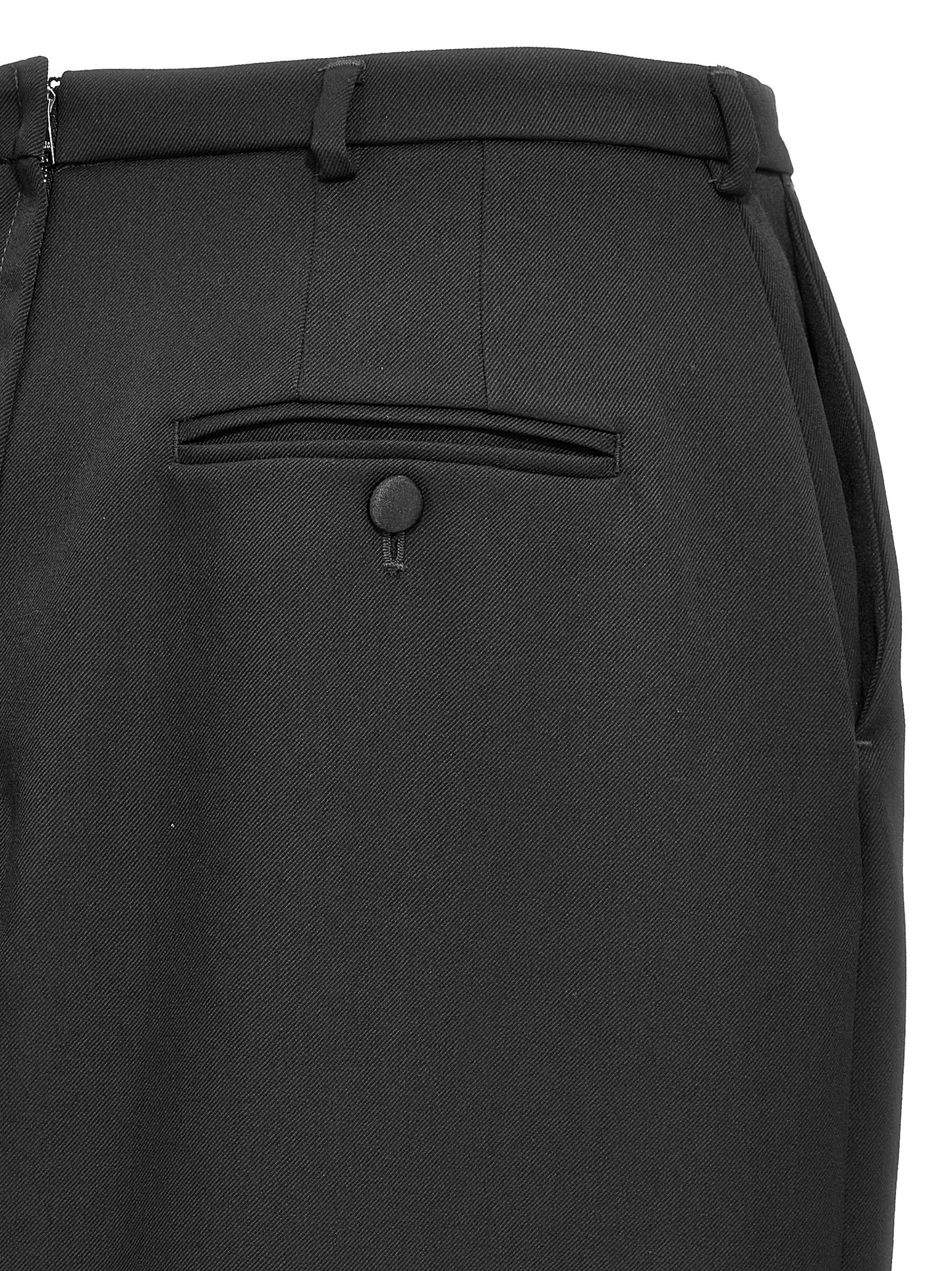 Skirt by Dolce & Gabbana for women in virgin wool black features a contoured silhouette from the Women's Virgin Wool Skirt collection, characterized by its contoured midi for a contoured finish.