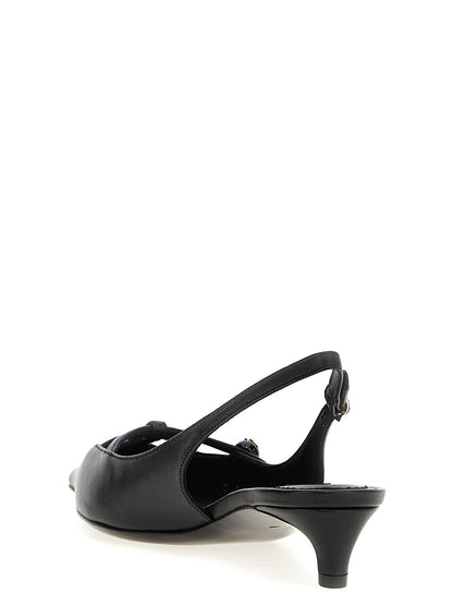 Mid-Heel Slingback Pumps Heels by Dolce & Gabbana for women in lamb leather black features a effortless chic silhouette, showcasing the Women's Lamb Leather Mid-Heel Slingback Pumps Heels design with a effortless chic mid-heel and for a effortless chic finish.