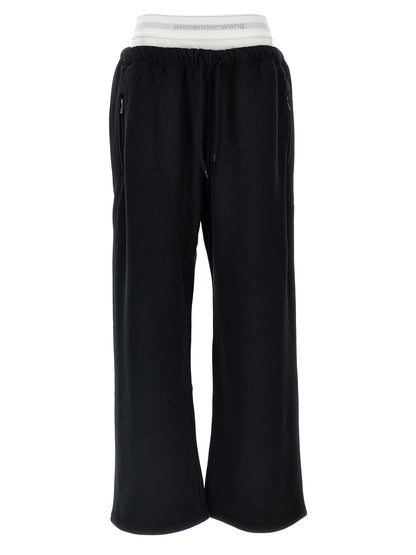 Joggers by T BY ALEXANDER WANG for women in cotton black presents a refined pantology silhouette, artfully defined by a refined pantology wide, long, and a sophisticated .