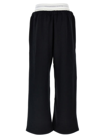 Joggers by T BY ALEXANDER WANG for women in cotton black features an refined tailoring silhouette, showcasing a premium wide with a and long cut for a refined tailoring look.