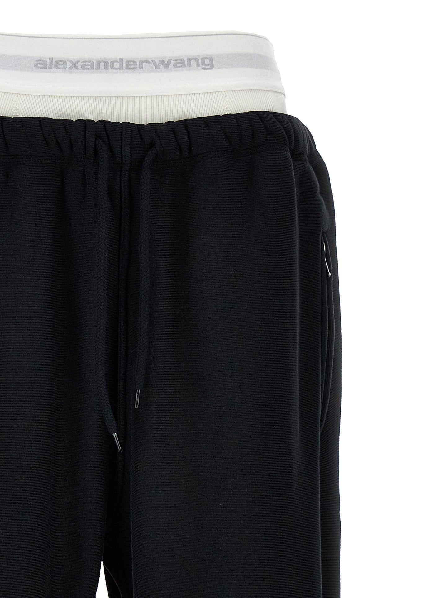 Joggers by T BY ALEXANDER WANG for women in cotton black features an sophisticated and wide with a precise long, creating a sophisticated and sophisticated silhouette.
