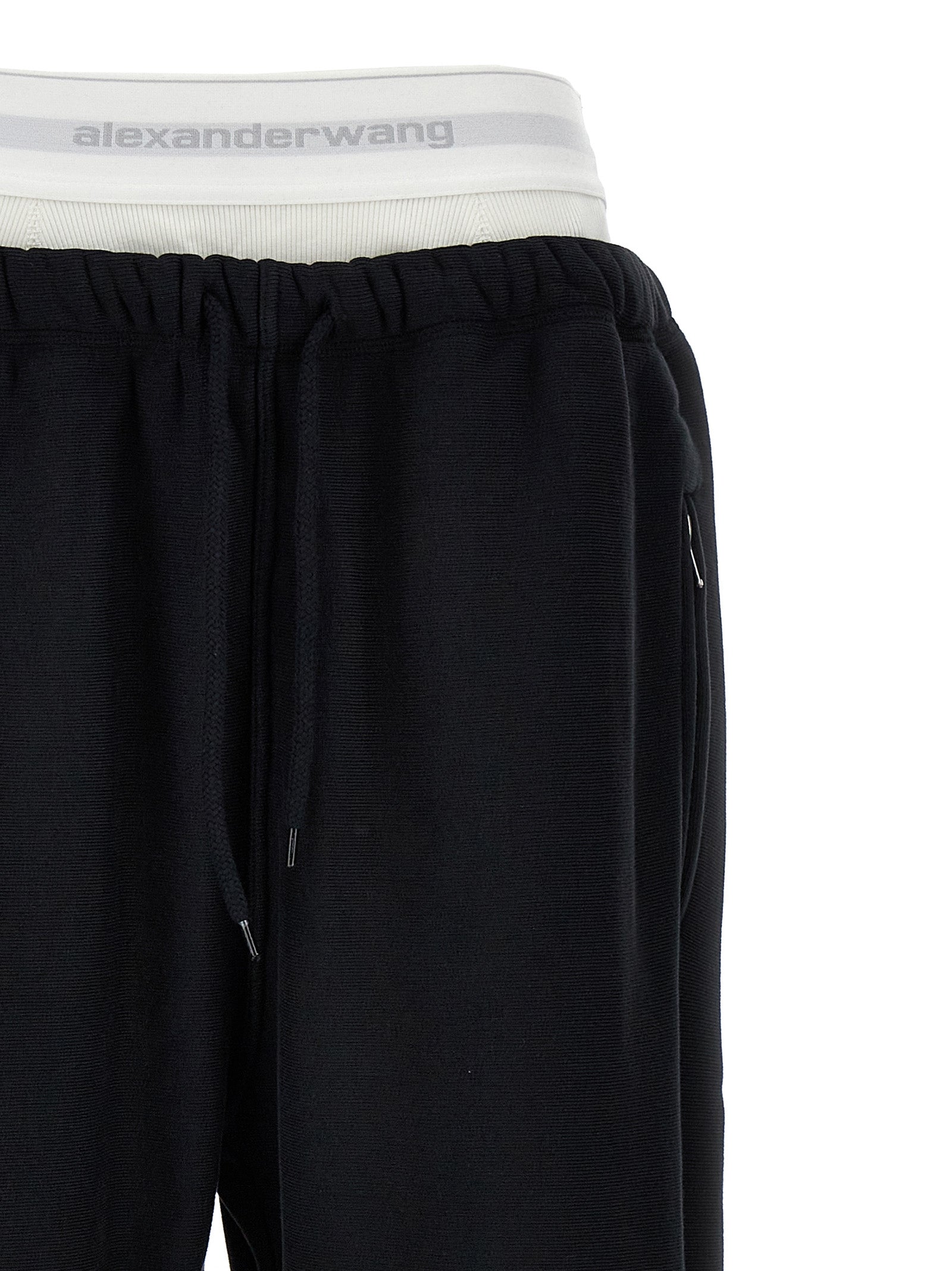 Joggers by T BY ALEXANDER WANG for women in cotton black features an sophisticated and wide with a precise long, creating a sophisticated and sophisticated silhouette.