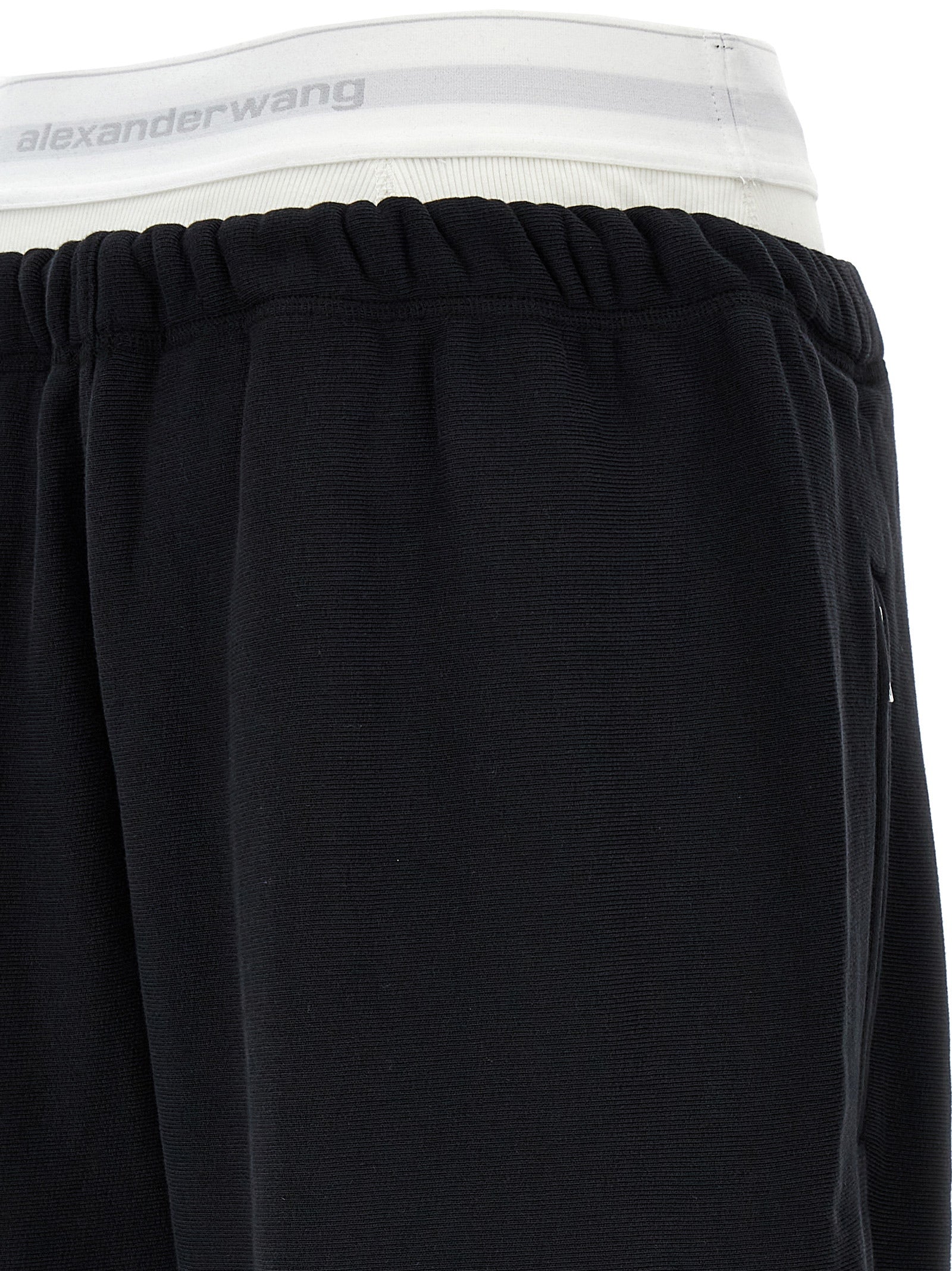 Joggers by T BY ALEXANDER WANG for women in cotton black features a polished silhouette with a polished wide, reaching a polished long and finished with a polished .
