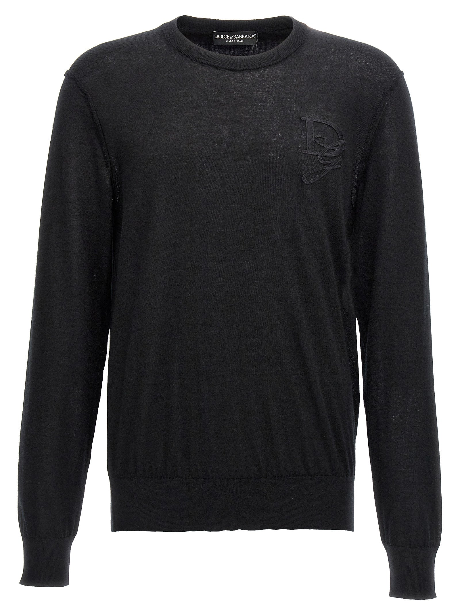 Cardigan by Dolce & Gabbana for men in cashmere black showcases a captivating silhouette, artfully detailed with a captivating and crew neckline for a truly sophisticated captivating look.