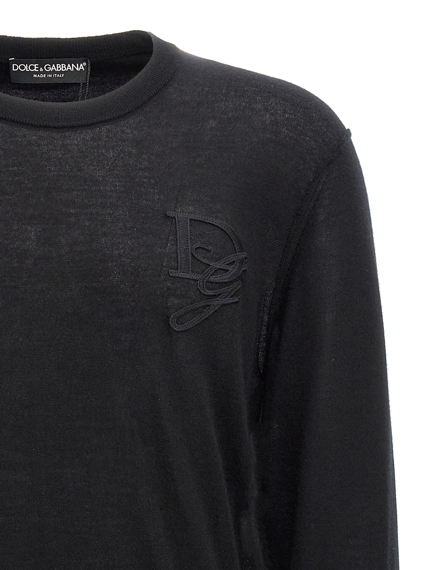 Cardigan by Dolce & Gabbana for men in cashmere black presents a textural silhouette, artfully finished with a textural crew neckline and for a sophisticated, textural look.