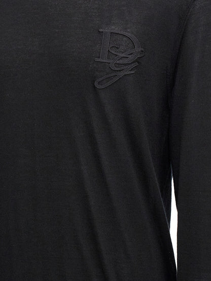 Cardigan by Dolce & Gabbana for men in cashmere black showcases a luxurious silhouette, meticulously detailed with a sophisticated and for a refined finish.