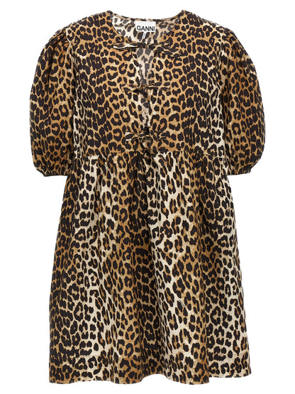 Dress by Ganni for women in organic cotton multicolor, leopard-print & print features an eye catching silhouette with a sophisticated crew neckline, elegant , and a refined short for a eye catching aesthetic.