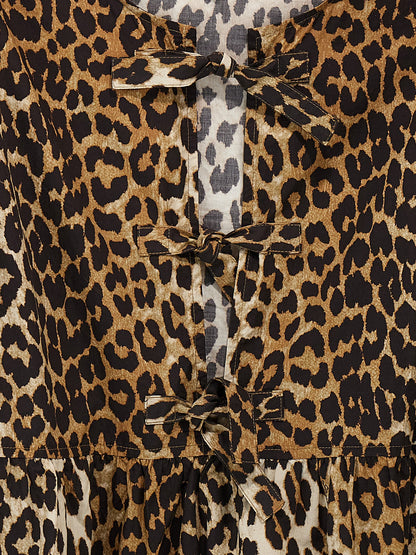 Dress by Ganni for women in organic cotton multicolor, leopard-print & print features an cute silhouette, detailed with a and that elegantly flows into a cute short.