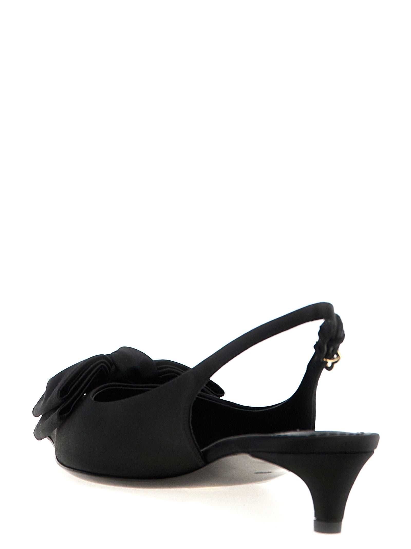 Mid-Heel Slingback Pumps Heels by Dolce & Gabbana for women in viscose silk satin black features an effortlessly chic silhouette from the Women's Viscose Silk Satin Mid-Heel Slingback Pumps Heels collection, showcasing a mid-heel and effortlessly chic for a effortlessly chic look.