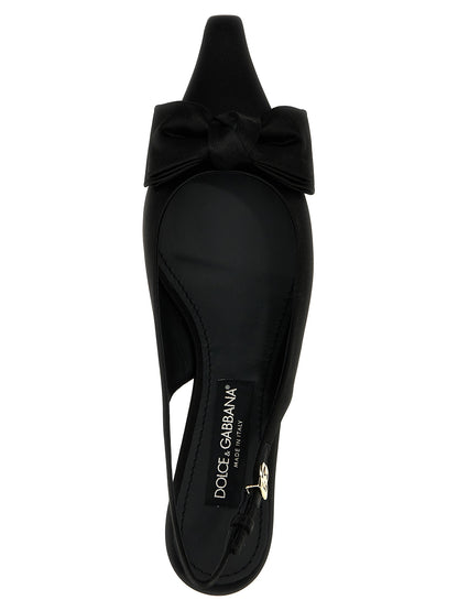 Mid-Heel Slingback Pumps Heels by Dolce & Gabbana for women in viscose silk satin and black showcases a effortlessly elegant silhouette as Women's Viscose Silk Satin Mid-Heel Slingback Pumps Heels, featuring a effortlessly elegant mid-heel and a effortlessly elegant for an elegant look.