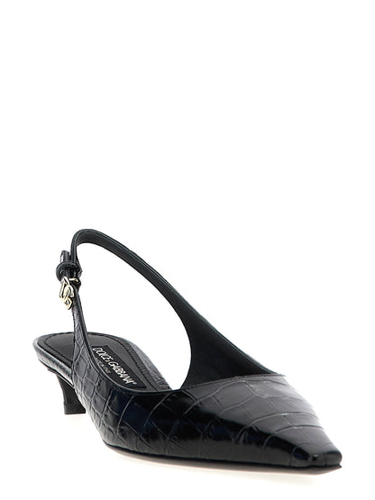 Low-Heel Mid-Heel Slingback Pumps Heels by Dolce & Gabbana for women in crocodile calfskin leather black & print features an captivating silhouette, showcasing the elegant Women's Crocodile Calfskin Leather Low-Heel Mid-Heel Slingback Pumps Heels design with a low-heel mid-heel and a sophisticated .