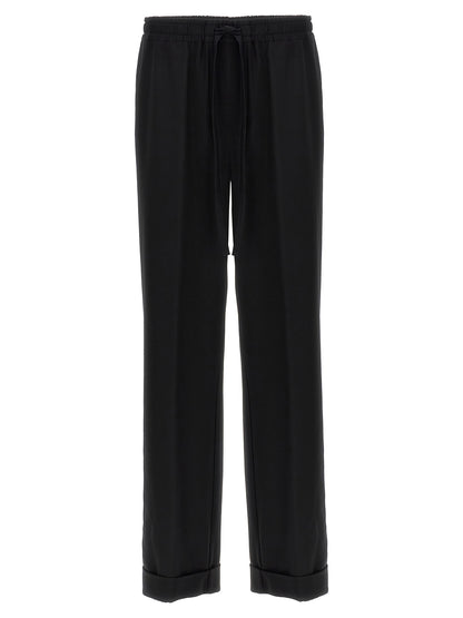 Casual Pants by Dolce & Gabbana for men in virgin wool black features an refined tailoring silhouette, showcasing a premium with a and long cut for a refined tailoring look.