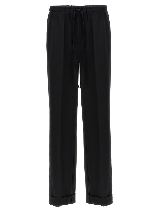 Casual Pants by Dolce & Gabbana for men in virgin wool black features an refined tailoring silhouette, showcasing a premium with a and long cut for a refined tailoring look.