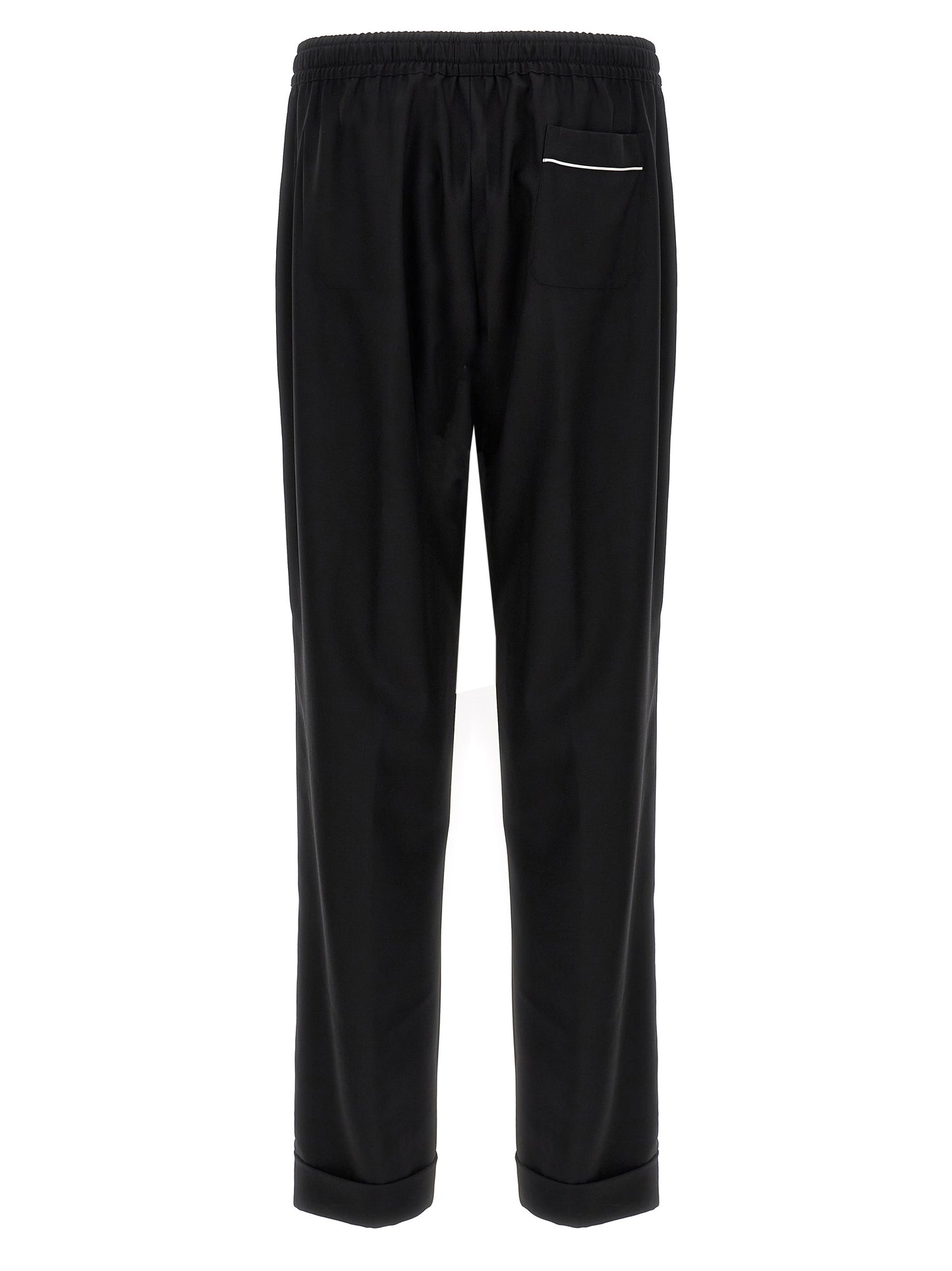 Casual Pants by Dolce & Gabbana for men in virgin wool black features a polished silhouette with a polished , reaching a polished long and finished with a polished .