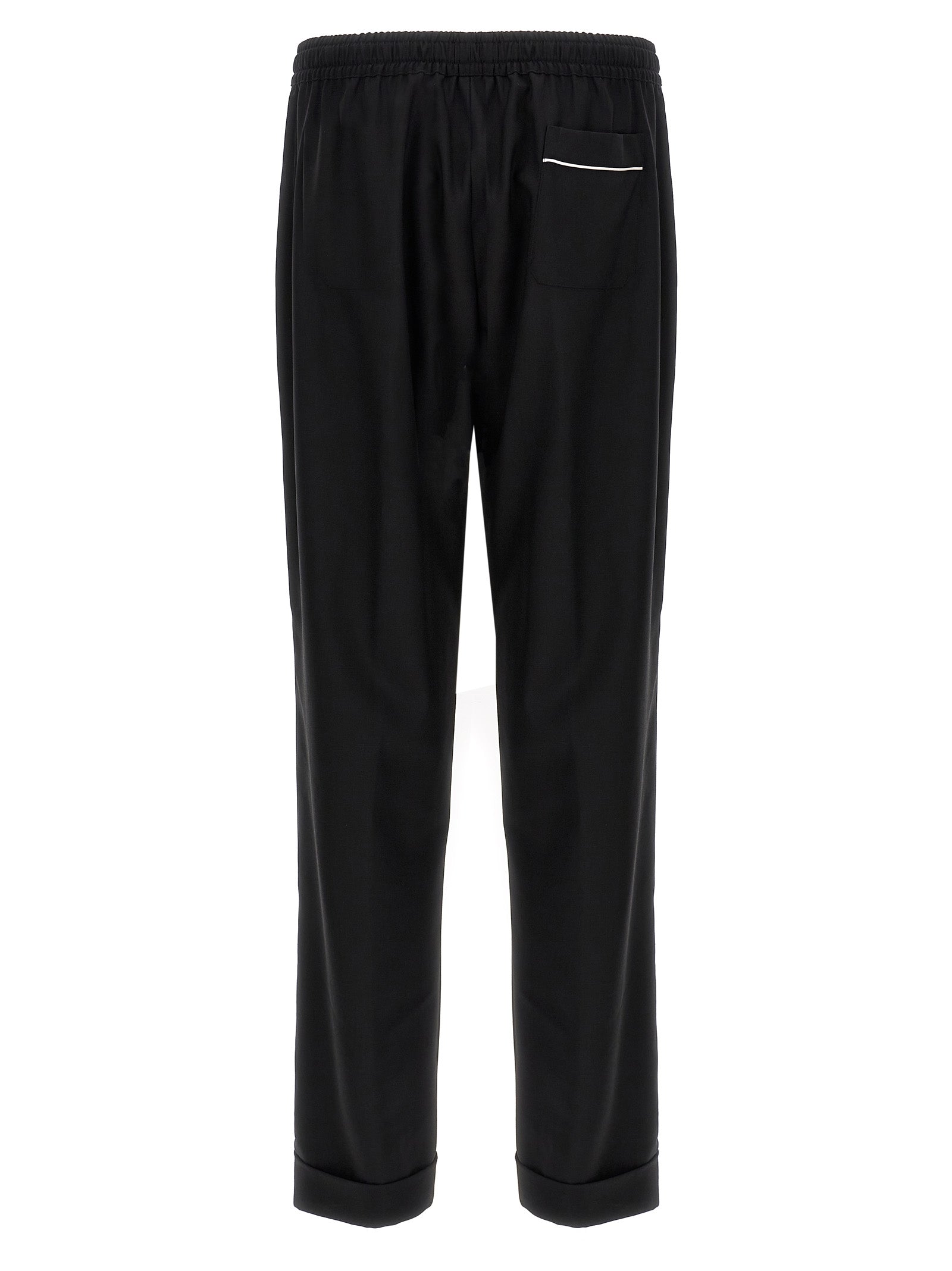Casual Pants by Dolce & Gabbana for men in virgin wool black features a polished silhouette with a polished , reaching a polished long and finished with a polished .