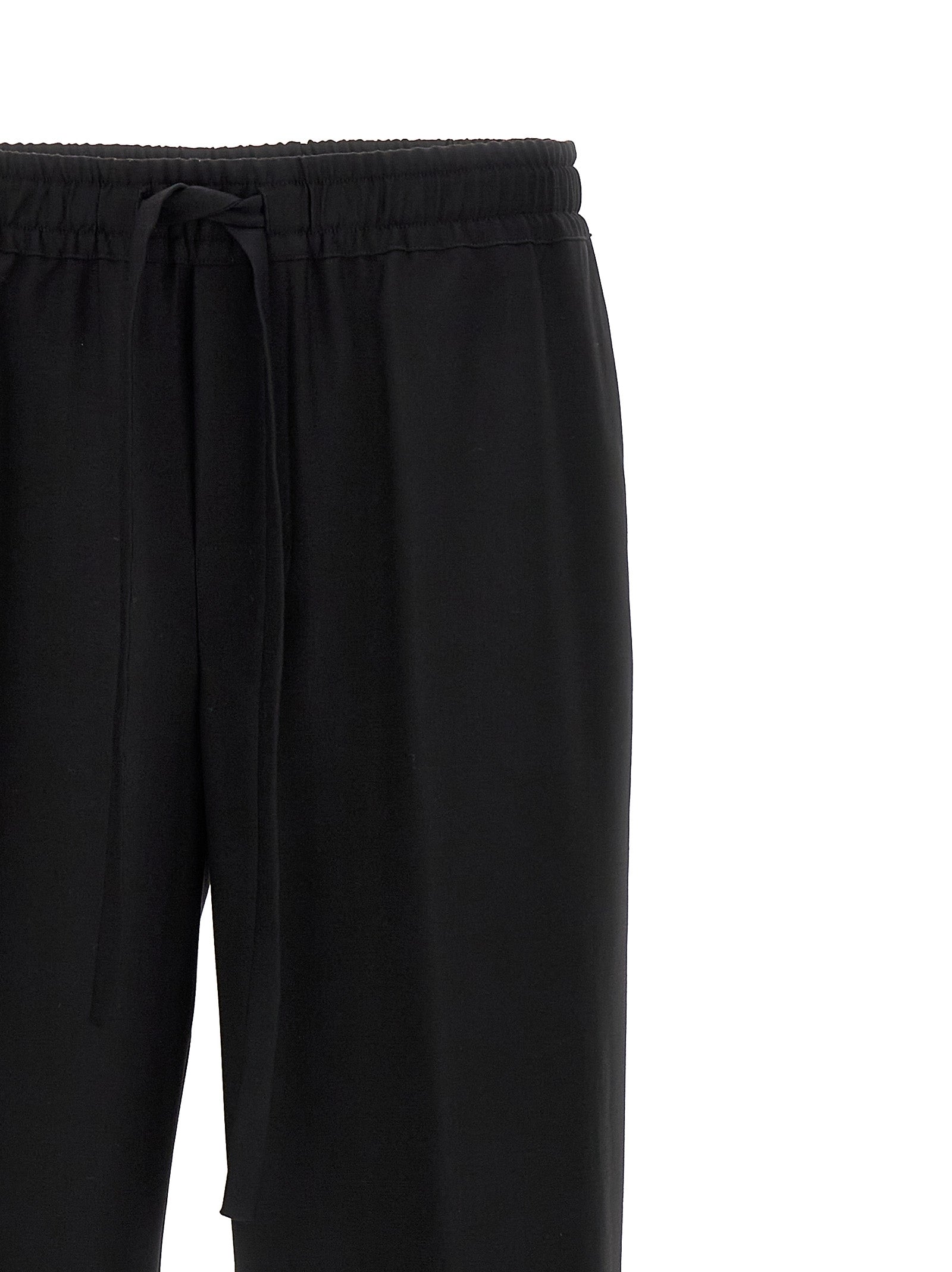 Casual Pants by Dolce & Gabbana for men in virgin wool black features an sartorial and long with a cut for a sartorial finish.