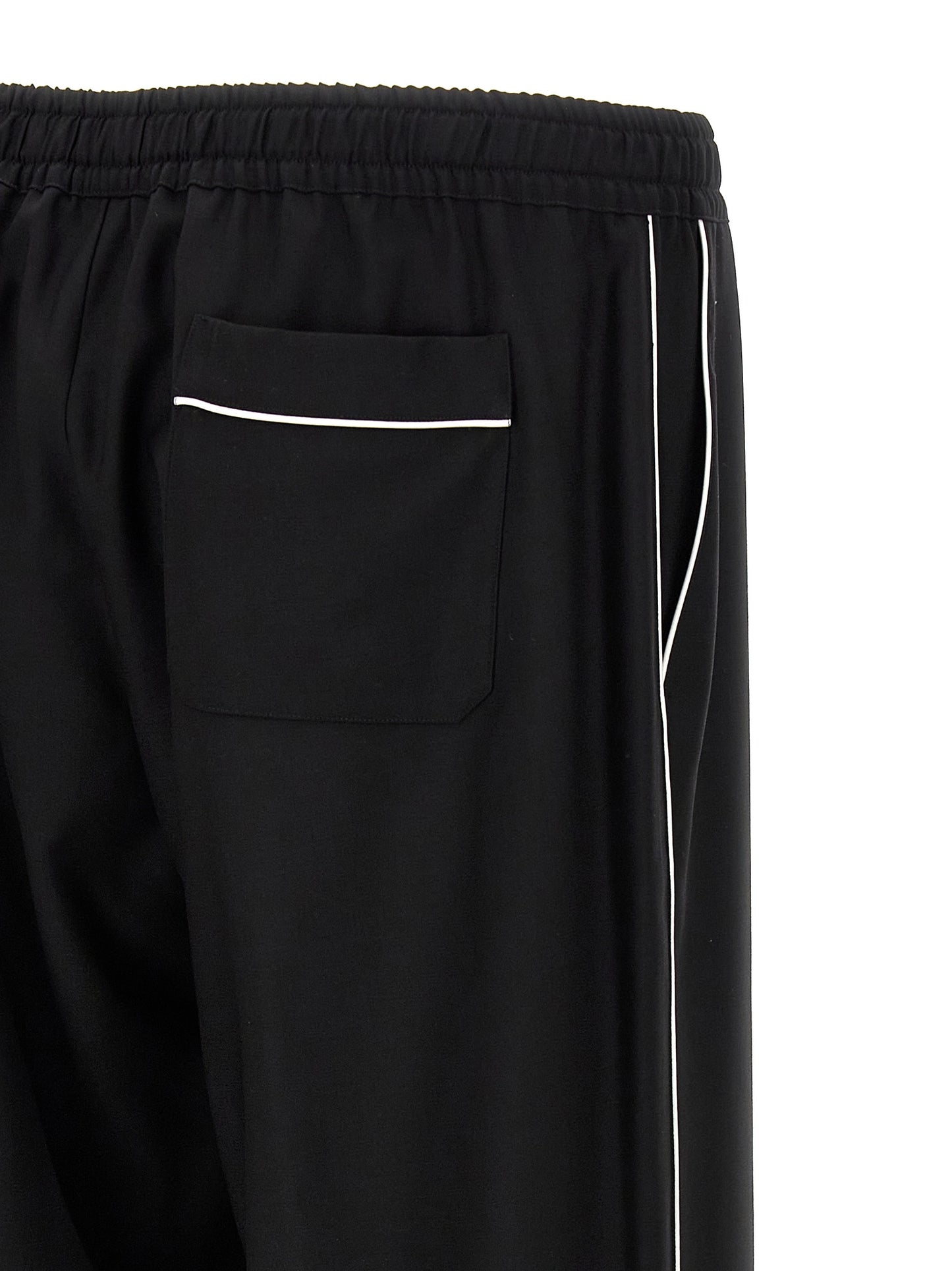 Casual Pants by Dolce & Gabbana for men in virgin wool black features a refined silhouette with a refined , defined by a and a refined long for a refined finish.