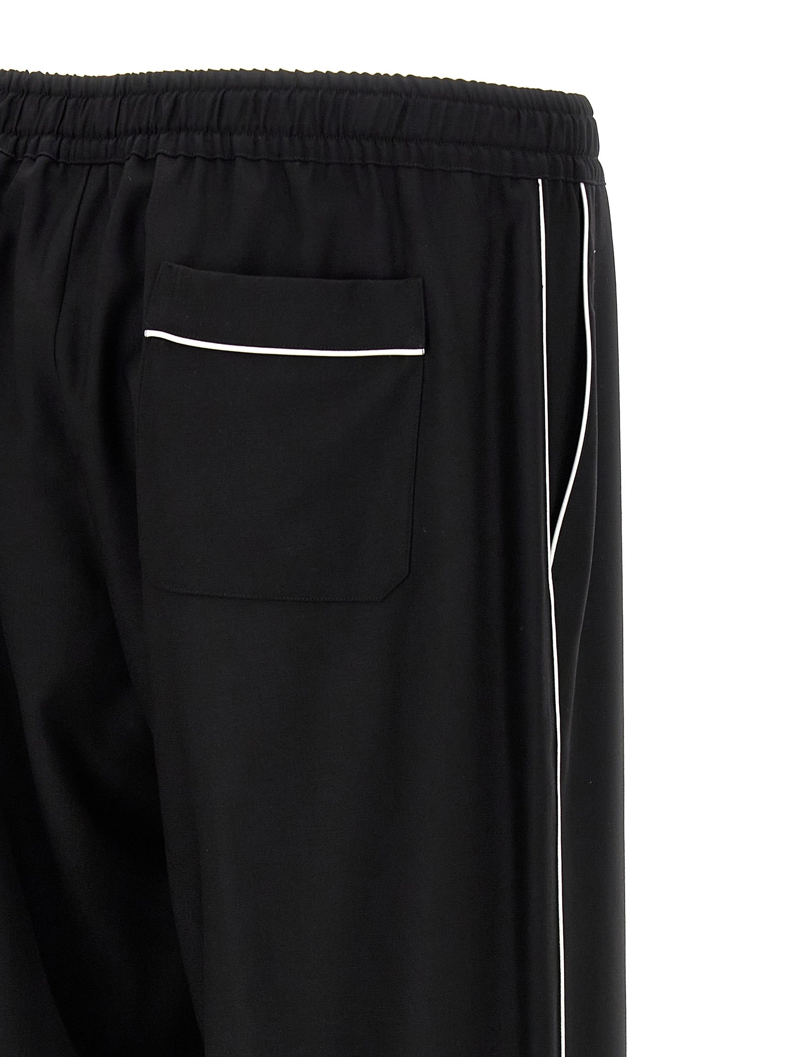 Casual Pants by Dolce & Gabbana for men in virgin wool black features a refined silhouette with a refined , defined by a and a refined long for a refined finish.