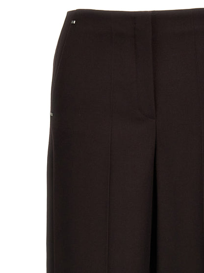 Trousers by Fendi for women in virgin wool purple presents a smart silhouette, meticulously detailed with a smart , a smart long, and a smart .