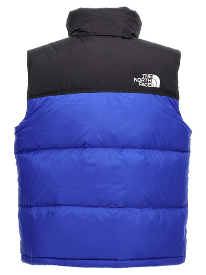 Hooded Vest by The North Face for men in plush nylon blue & signature showcases a utilitarian silhouette, artfully incorporating pockets & hooded and a utilitarian hooded neckline for a truly utilitarian finish.